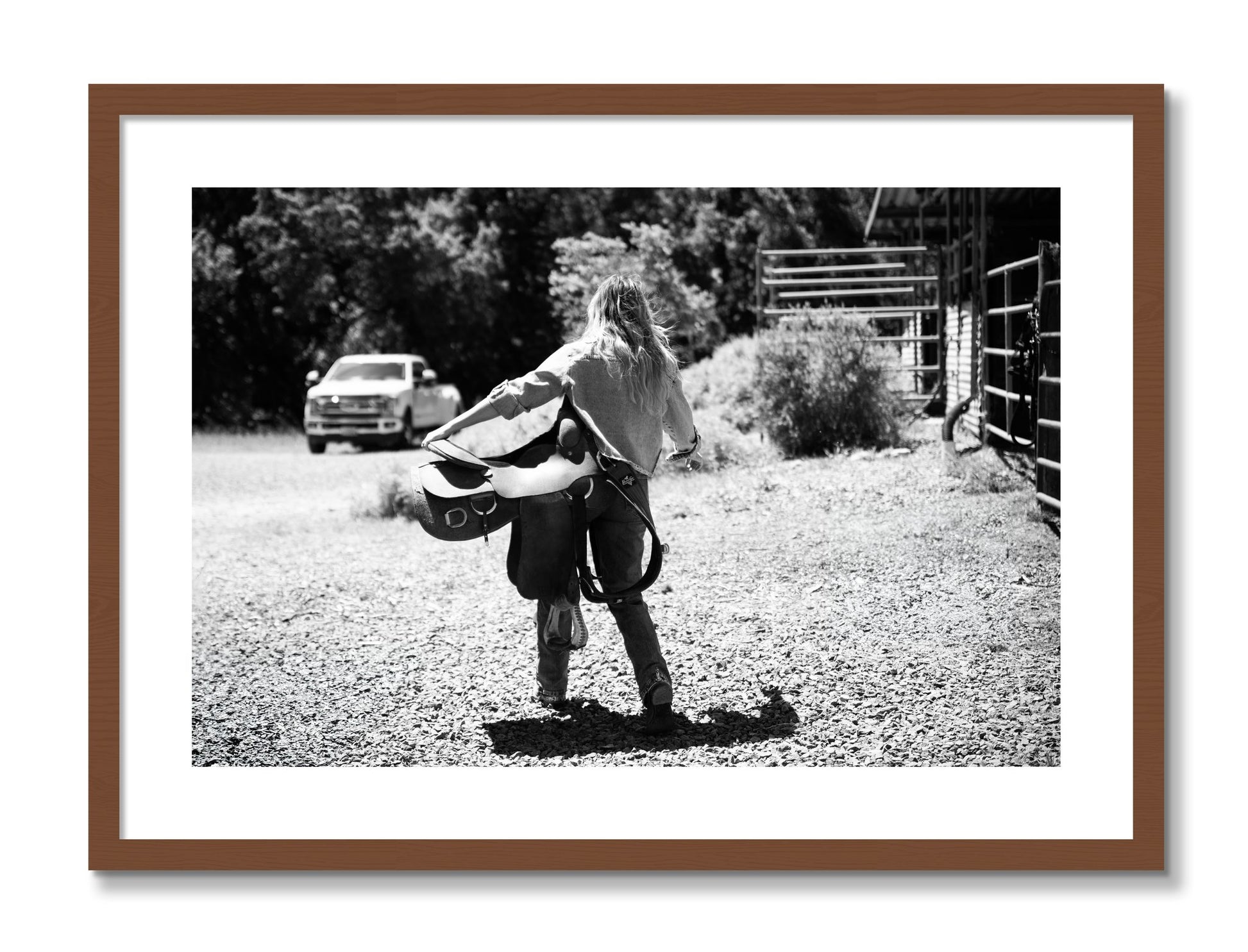 Framed photograph of Saddle Up by Dylan Ozanich, Walnut frame, Borders