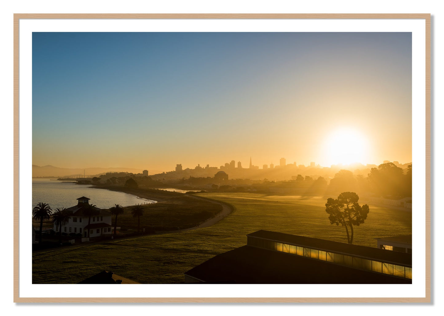Framed photograph of San Francisco At Dawn by Dylan Ozanich, Oak frame, Borders