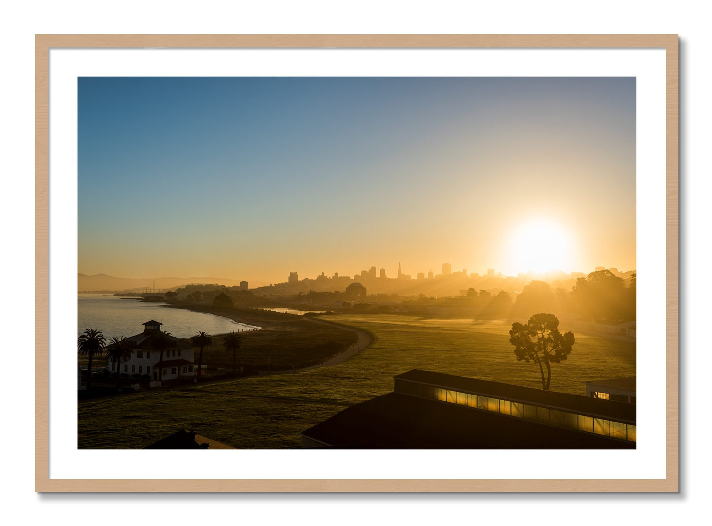 Framed photograph of San Francisco At Dawn by Dylan Ozanich, Oak frame, Borders