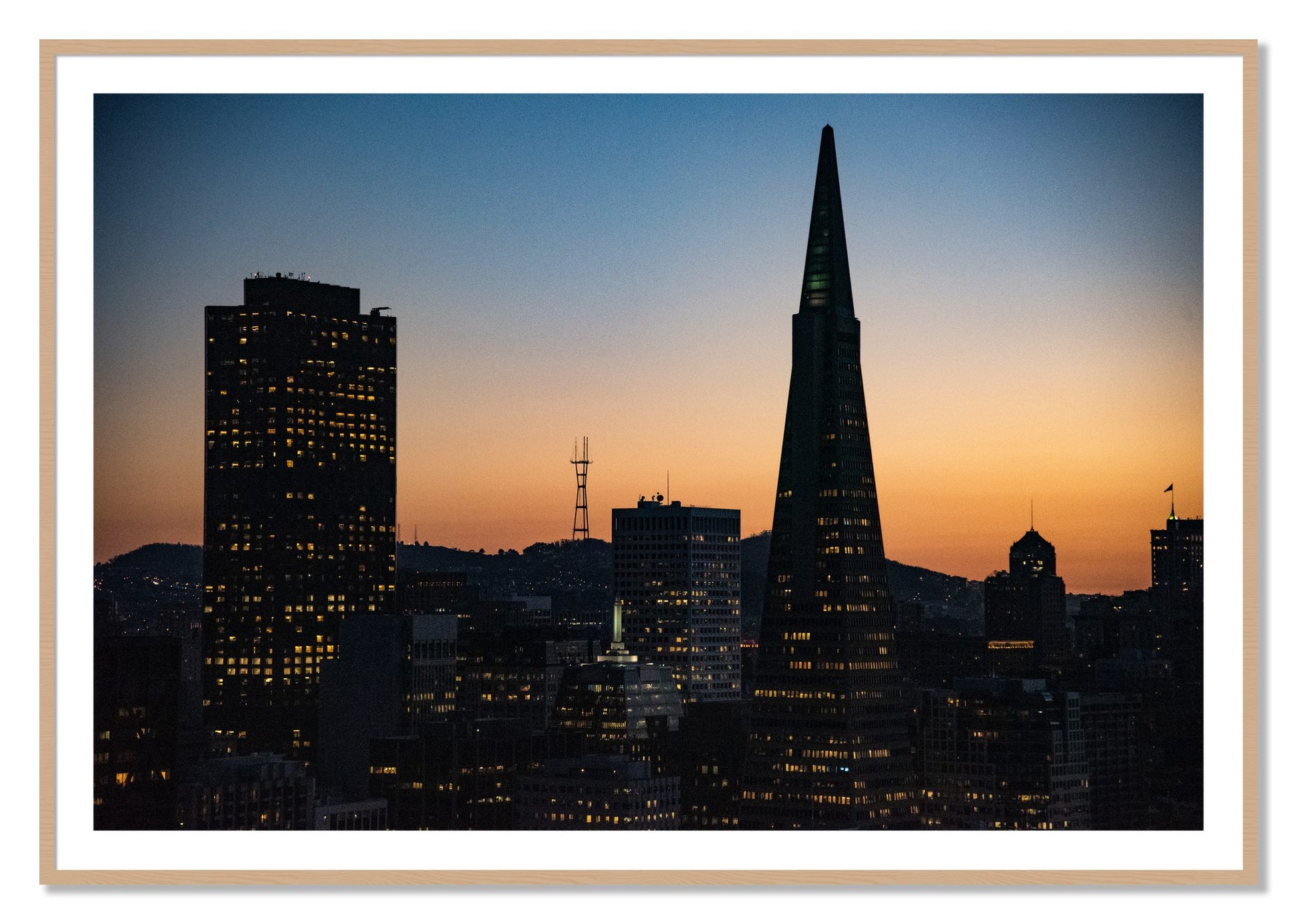 Framed photograph of San Francisco Skyline by Dylan Ozanich, Oak frame, Borders