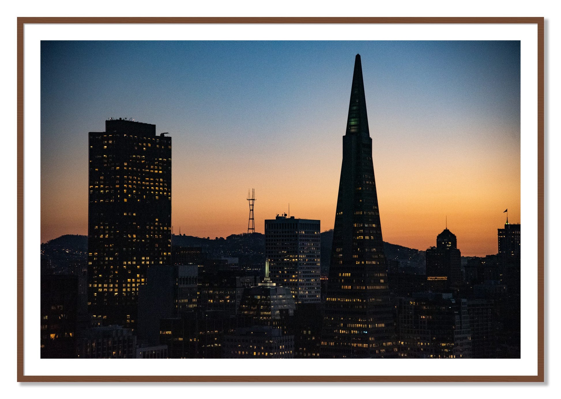 Framed photograph of San Francisco Skyline by Dylan Ozanich, Walnut frame, Borders