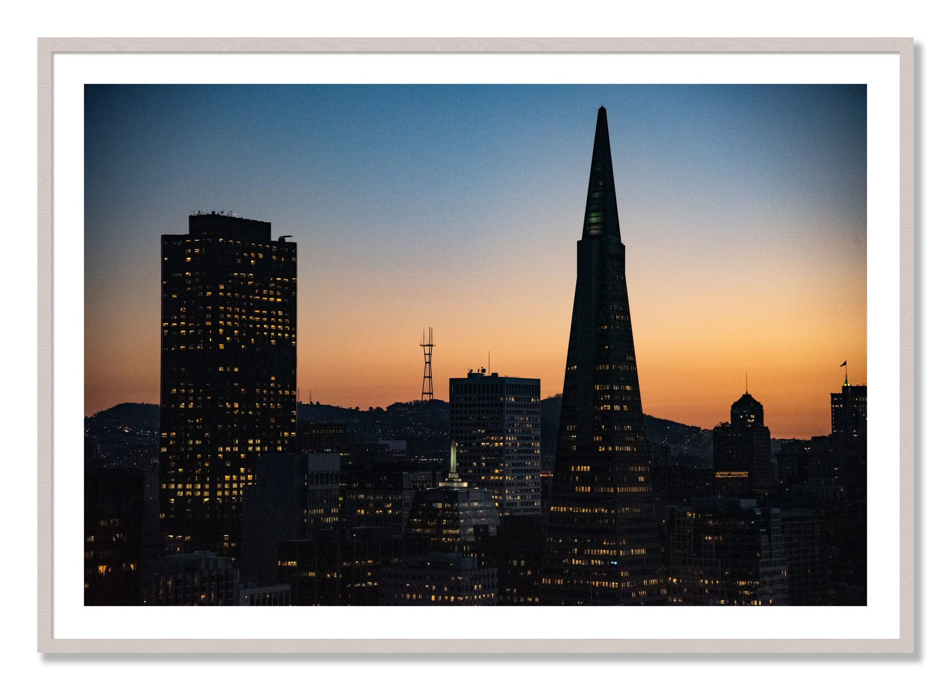 Framed photograph of San Francisco Skyline by Dylan Ozanich, White Maple frame, Borders
