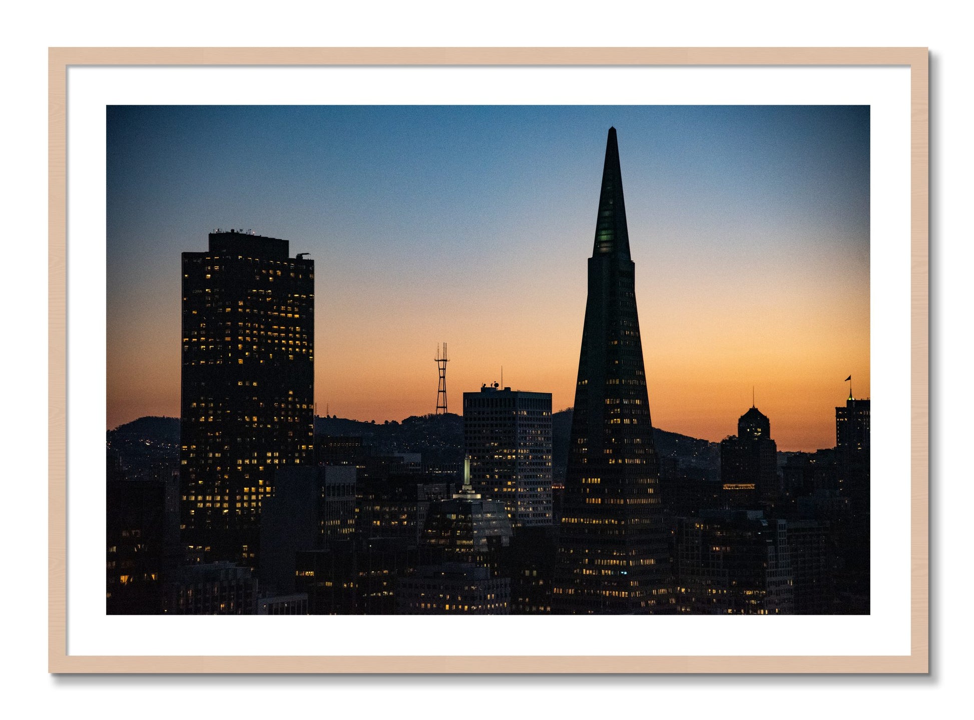 Framed photograph of San Francisco Skyline by Dylan Ozanich, Maple frame, Borders
