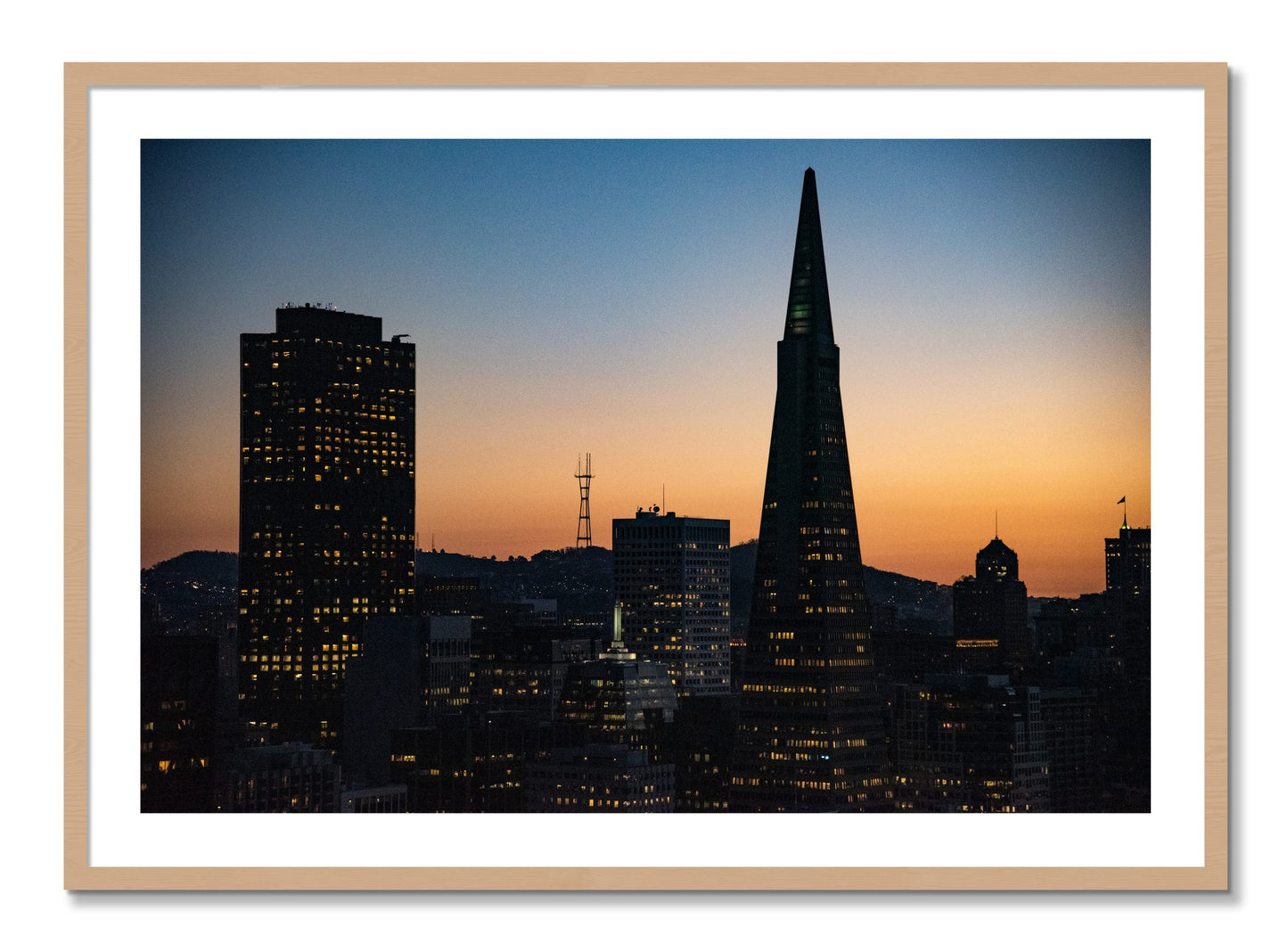 Framed photograph of San Francisco Skyline by Dylan Ozanich, Oak frame, Borders