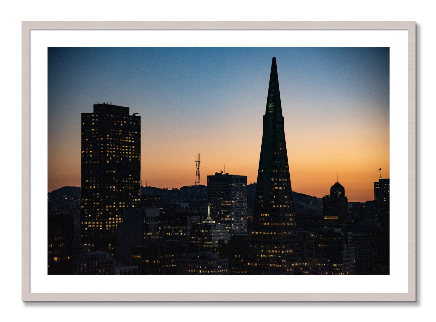 Framed photograph of San Francisco Skyline by Dylan Ozanich, White Maple frame, Borders