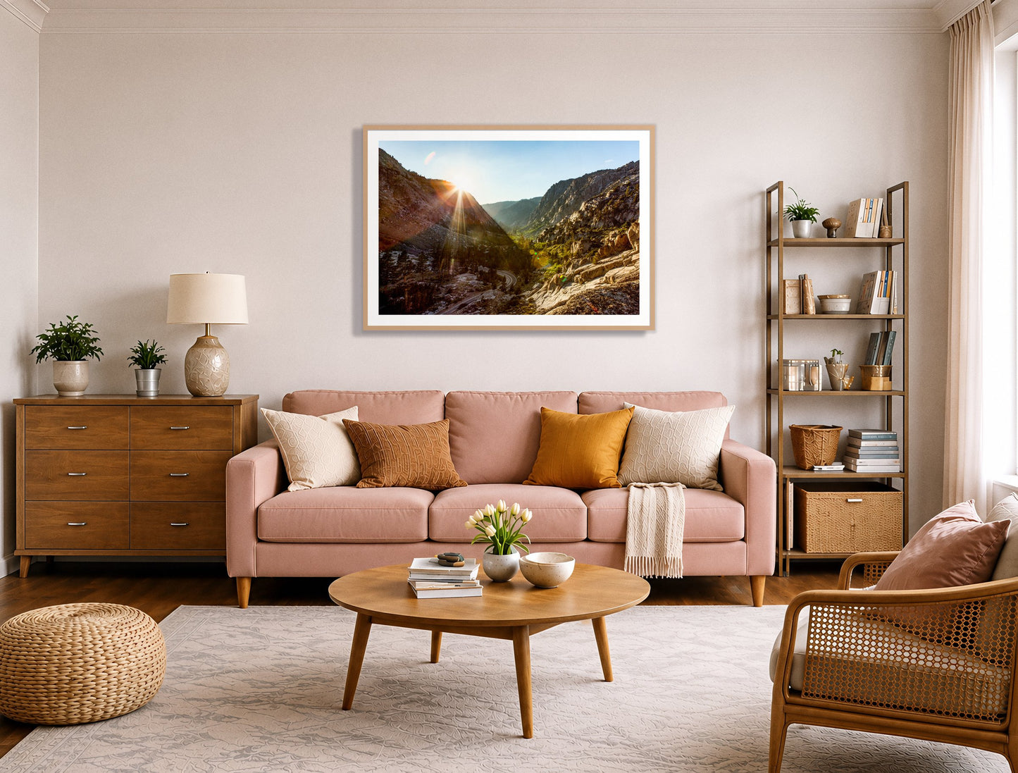 Sierra Nevadas by Dylan Ozanich in an Oak frame, above a blush pink sofa in a warm, eclectic living room