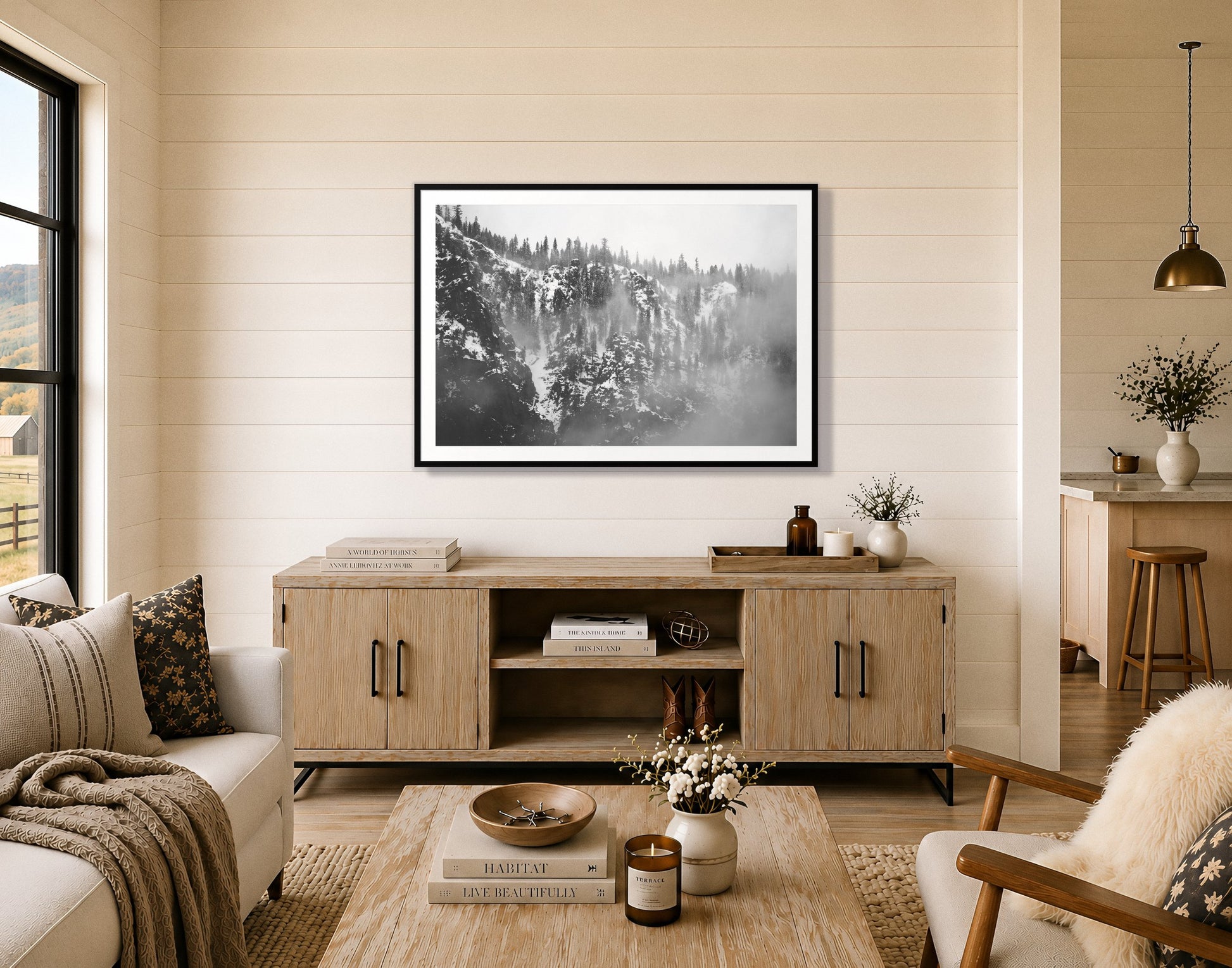 SIerra Snow by Dylan Ozanich in a Black frame, on a shiplap wall above an oak credenza in a modern farmhouse living room