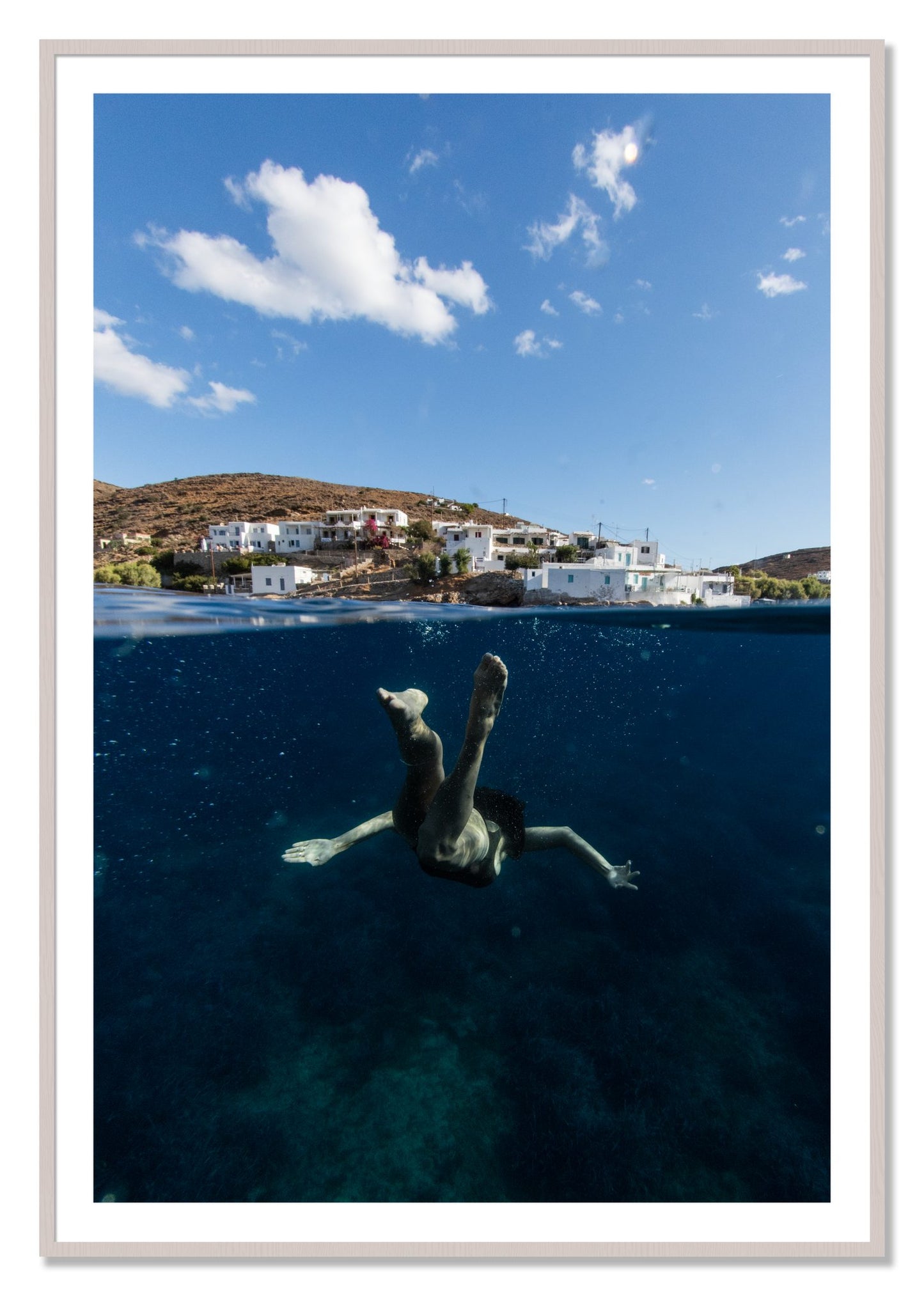 Framed photograph of Split Sea by Dylan Ozanich, White Maple frame, Borders