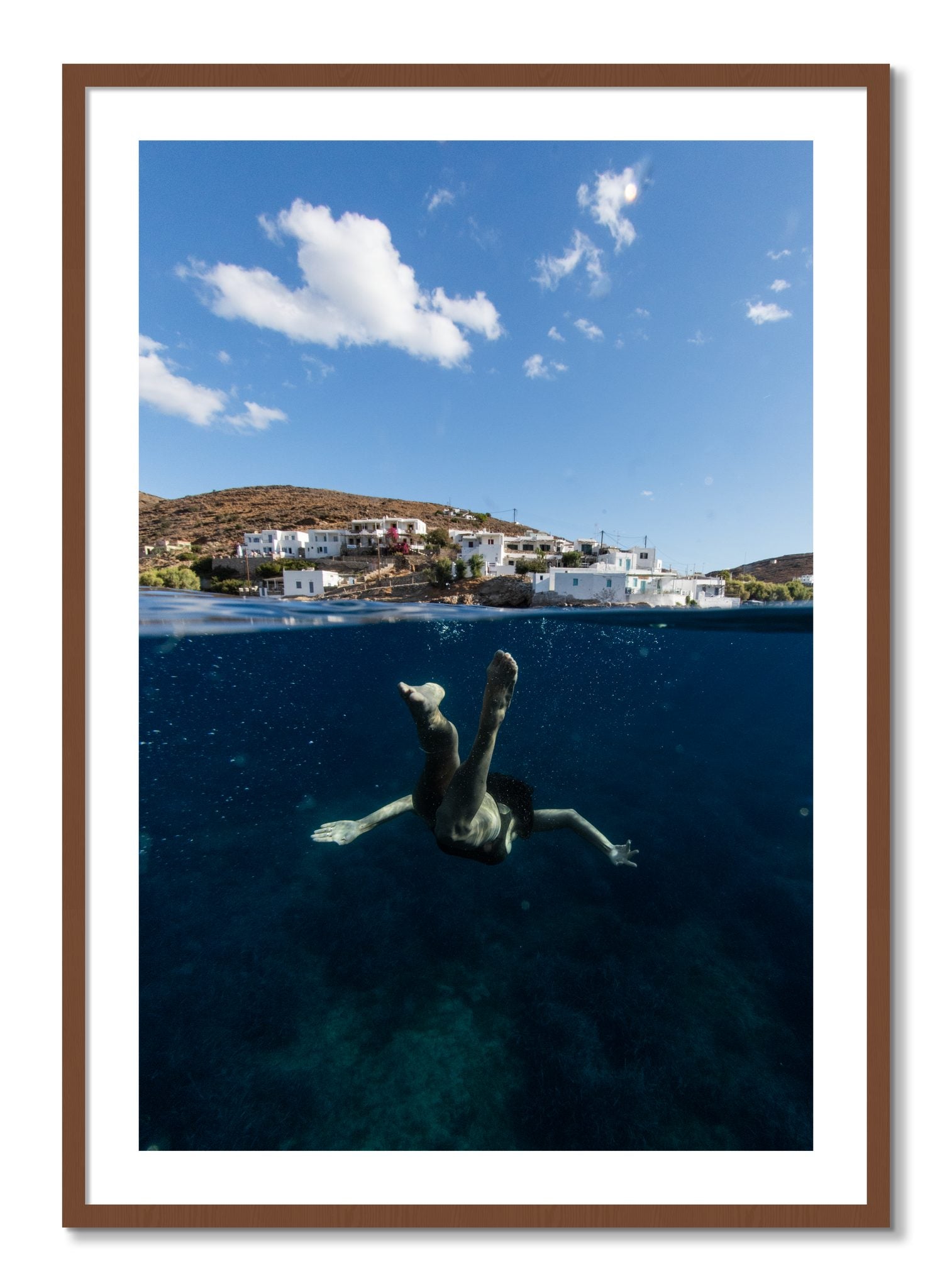Framed photograph of Split Sea by Dylan Ozanich, Walnut frame, Borders