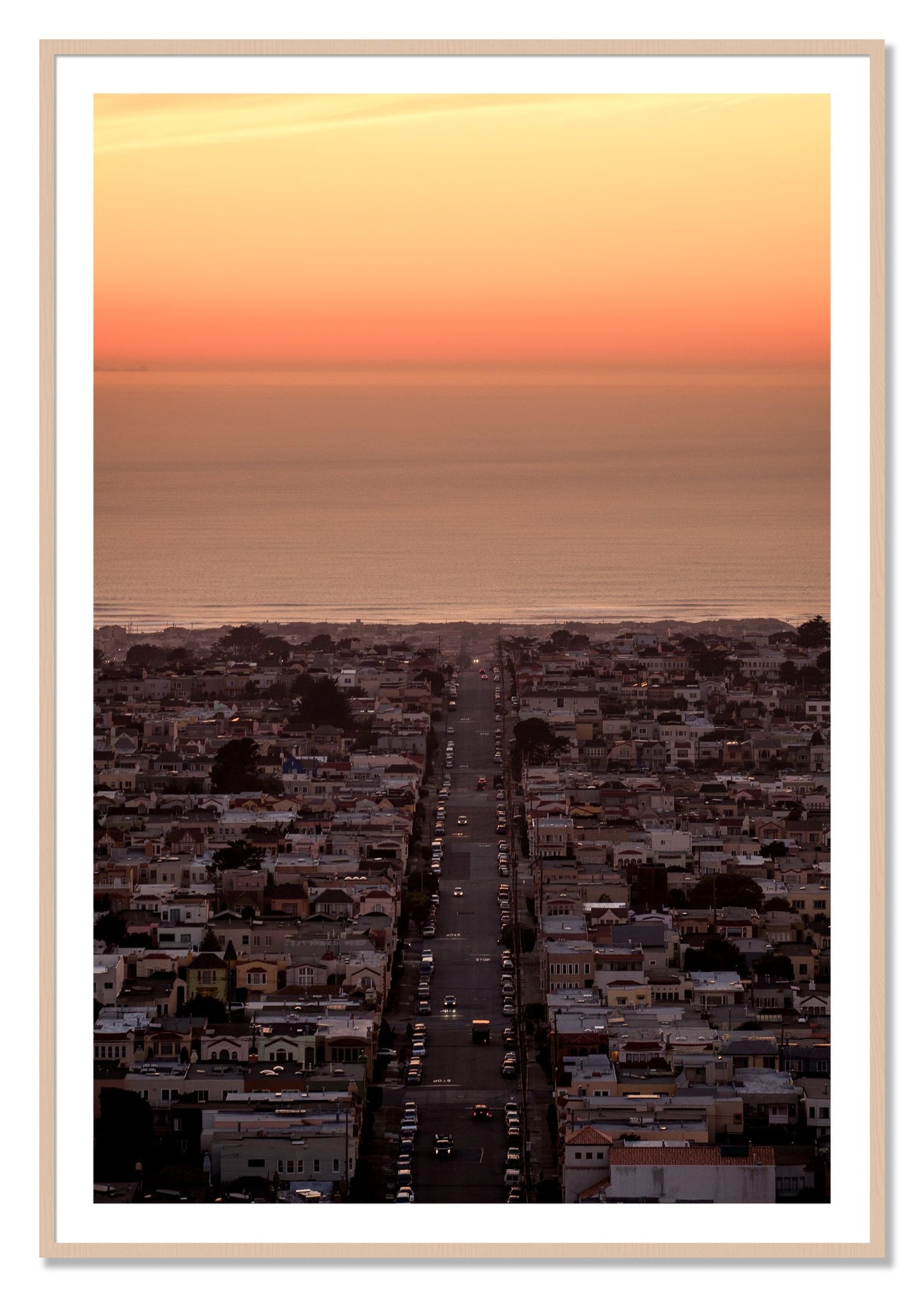 Framed photograph of Sunset Streets by Dylan Ozanich, Maple frame, Borders