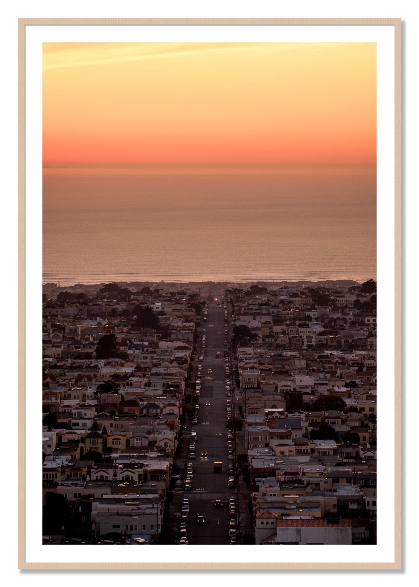 Framed photograph of Sunset Streets by Dylan Ozanich, Maple frame, Borders