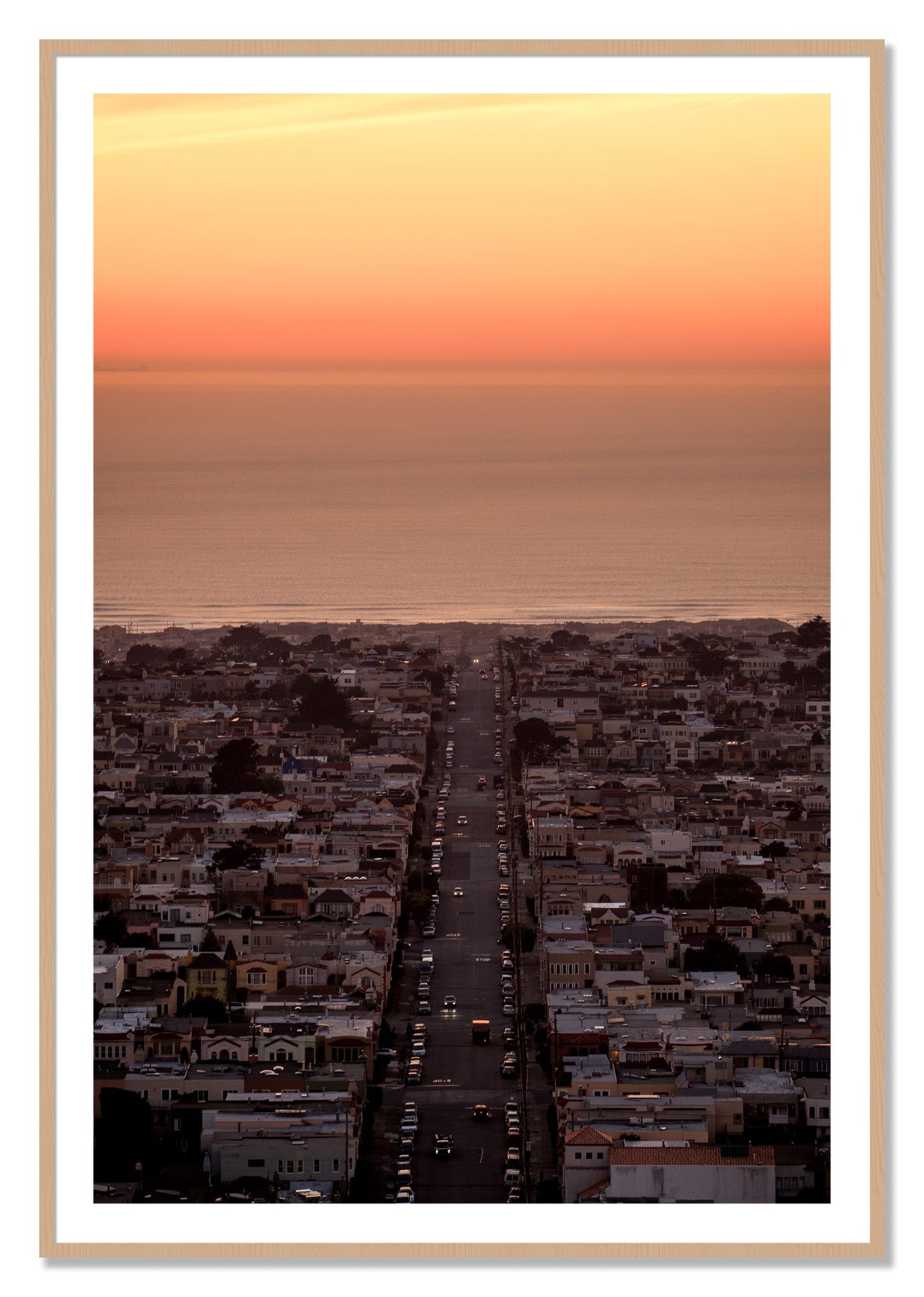 Framed photograph of Sunset Streets by Dylan Ozanich, Oak frame, Borders