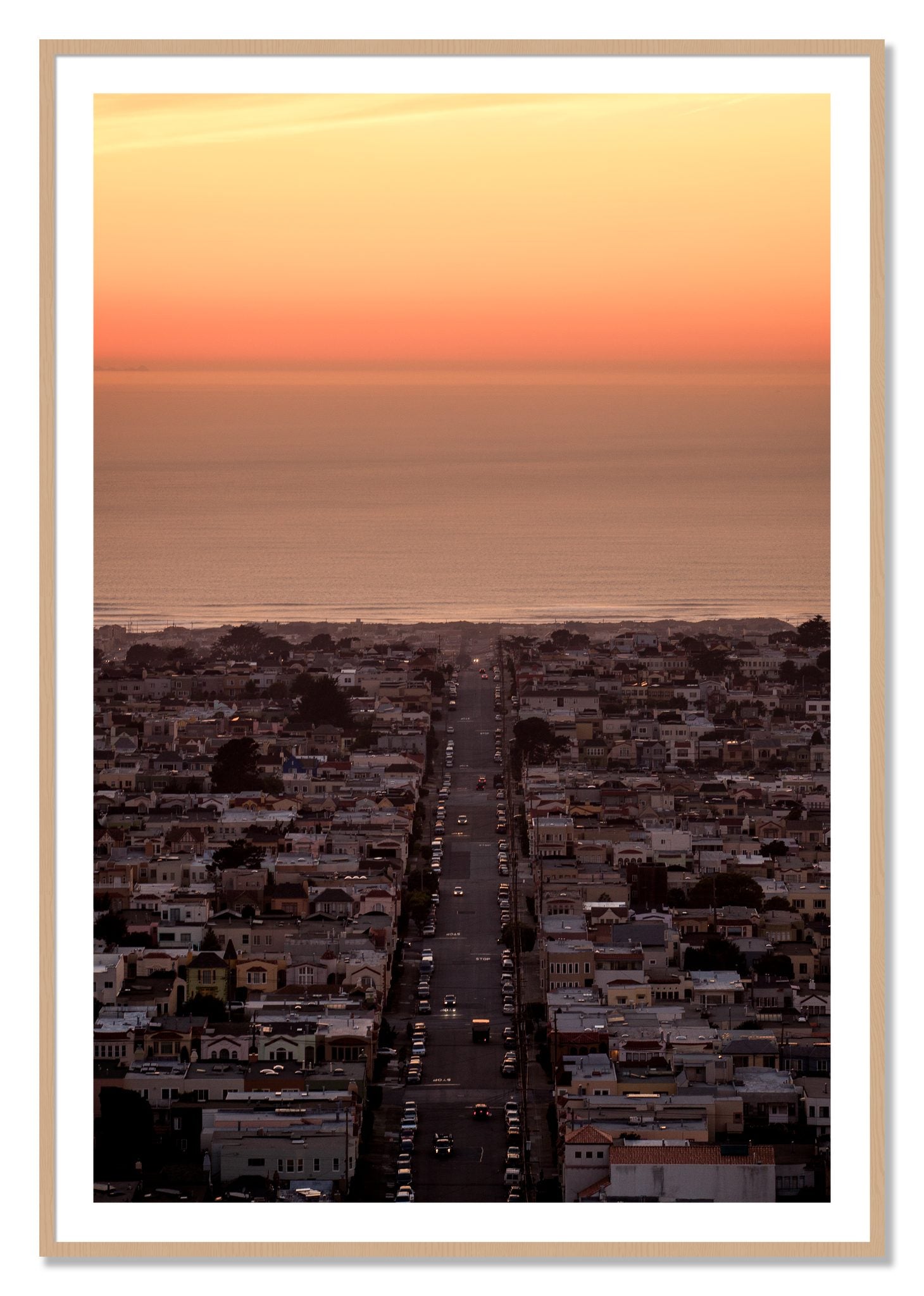 Framed photograph of Sunset Streets by Dylan Ozanich, Oak frame, Borders