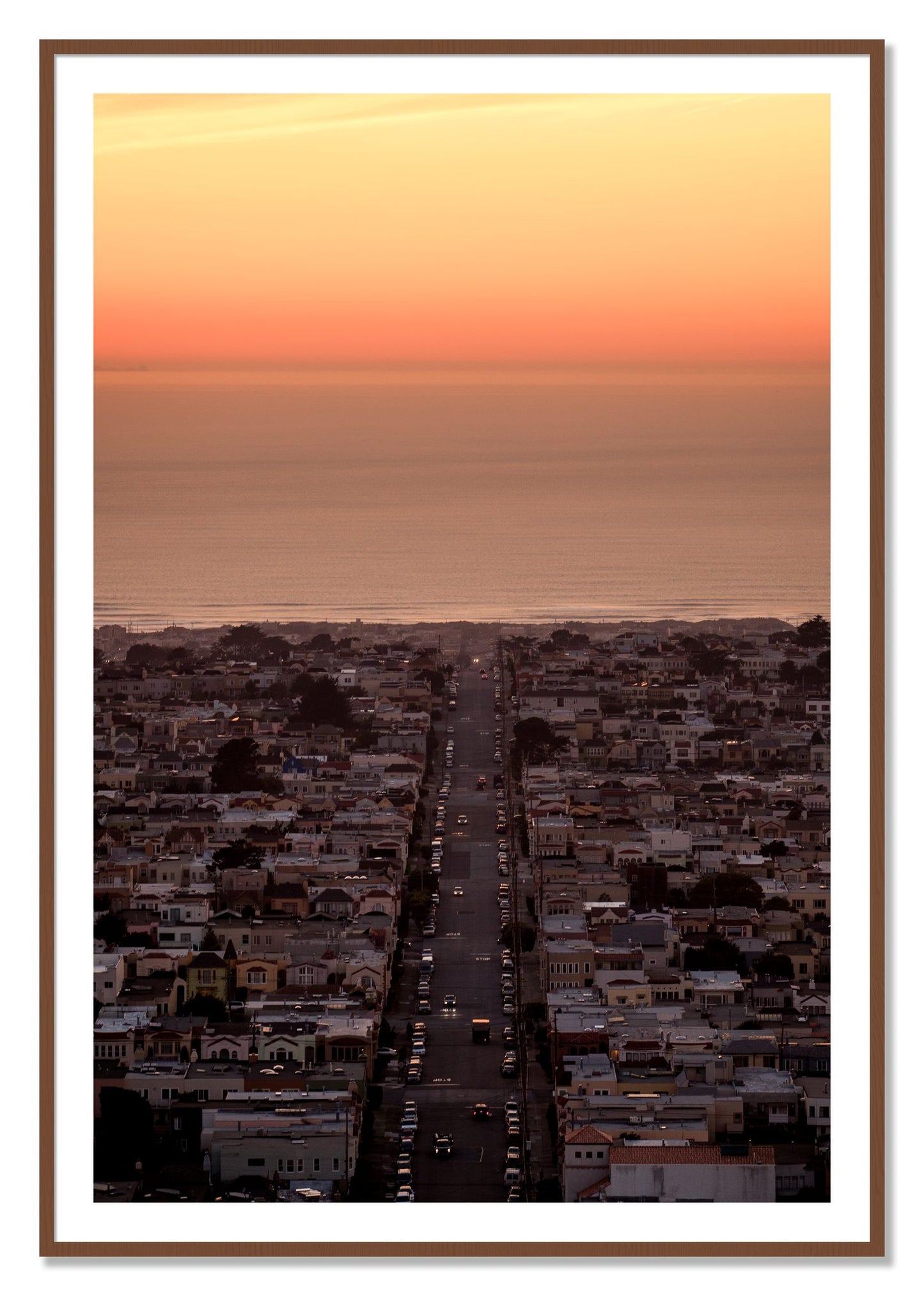 Framed photograph of Sunset Streets by Dylan Ozanich, Walnut frame, Borders