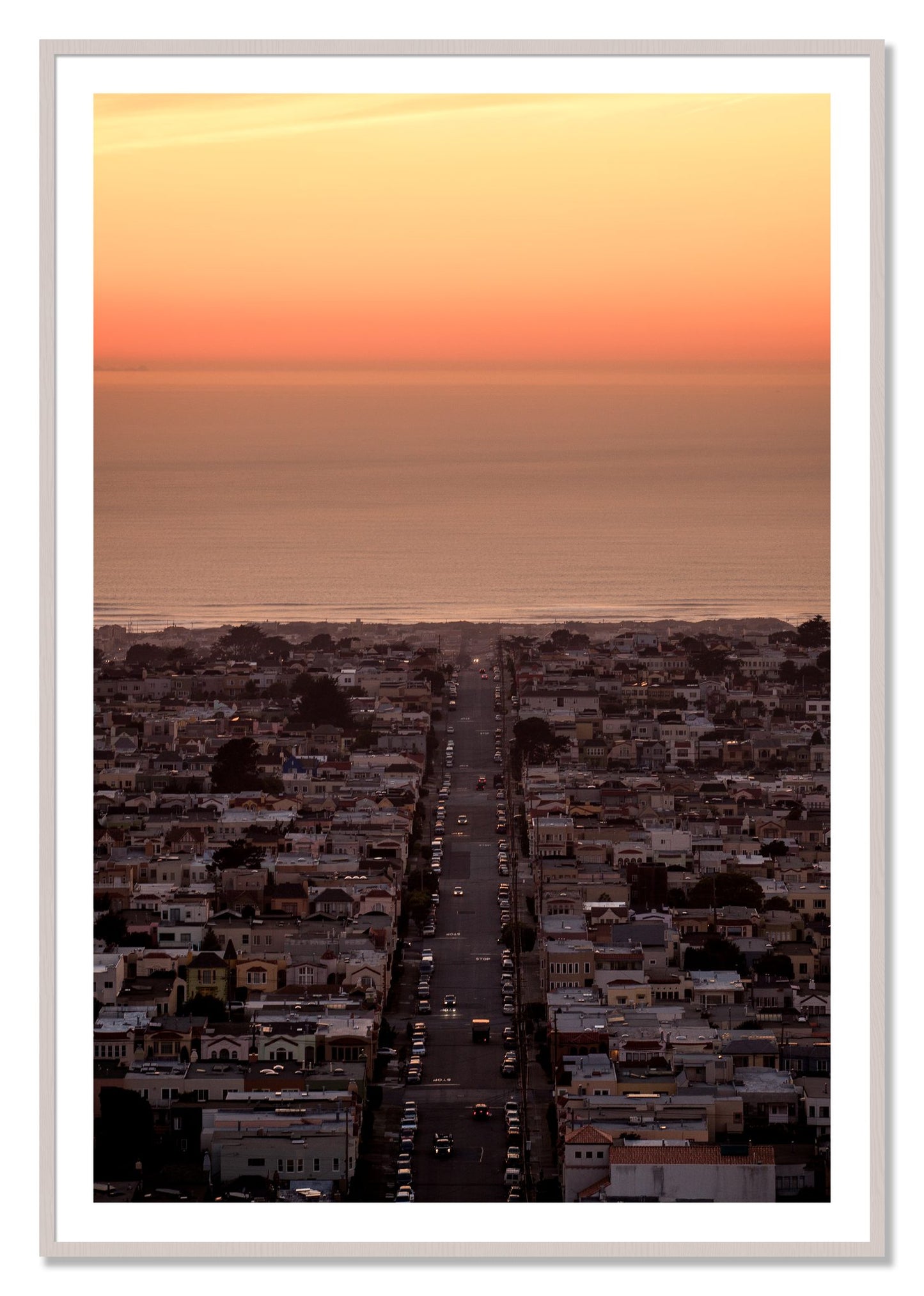 Framed photograph of Sunset Streets by Dylan Ozanich, White Maple frame, Borders