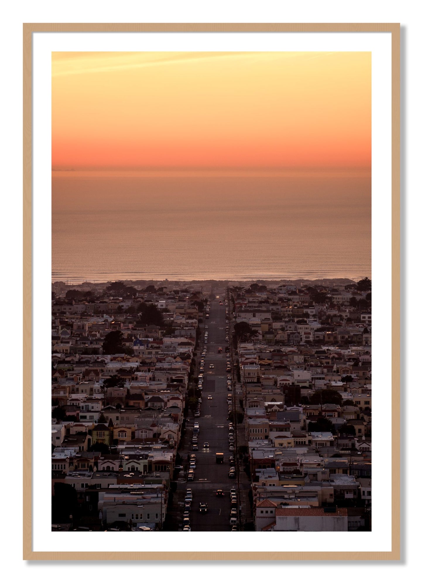 Framed photograph of Sunset Streets by Dylan Ozanich, Oak frame, Borders