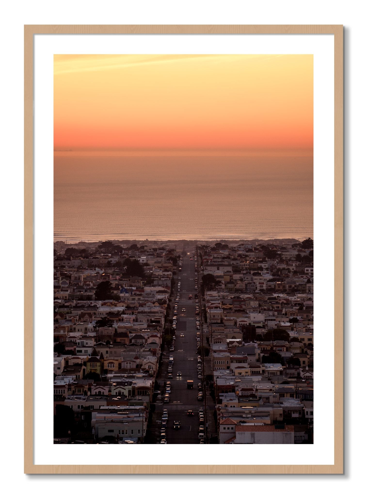 Framed photograph of Sunset Streets by Dylan Ozanich, Oak frame, Borders