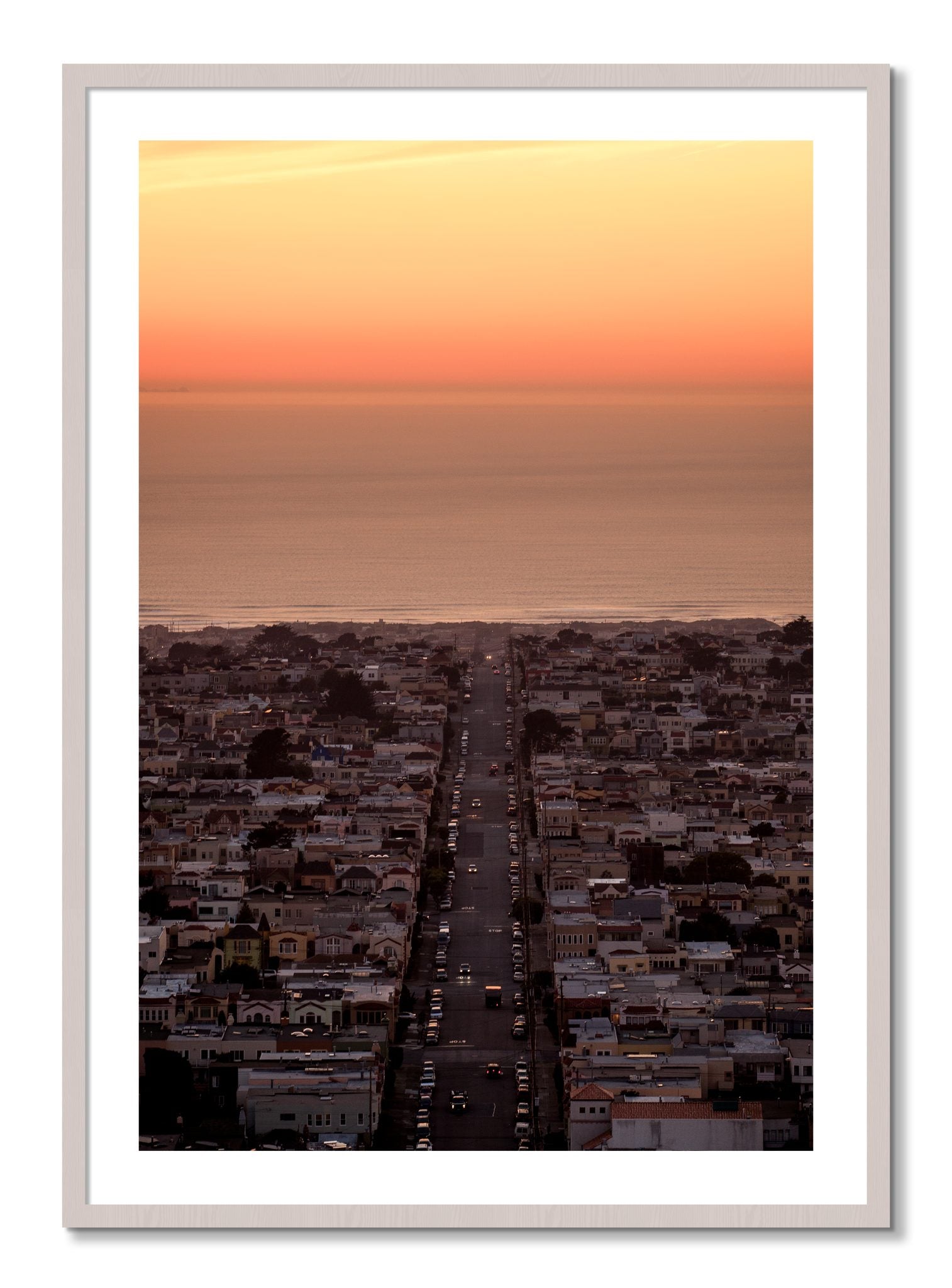 Framed photograph of Sunset Streets by Dylan Ozanich, White Maple frame, Borders