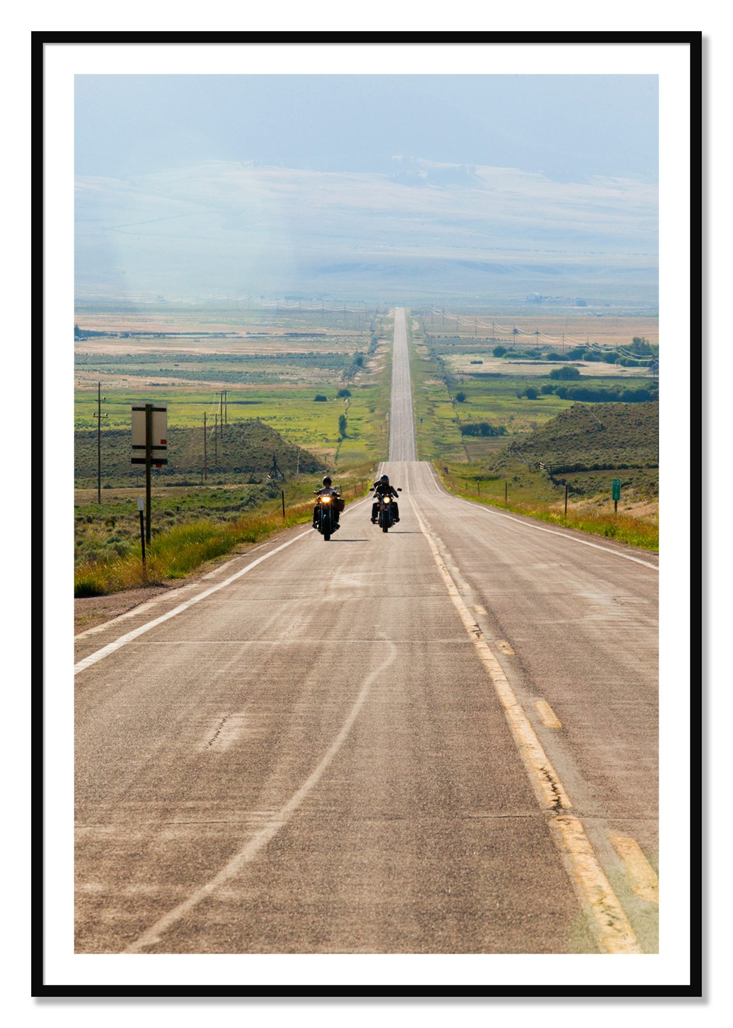 Framed photograph of The Long Road by Dylan Ozanich, Black frame, Borders