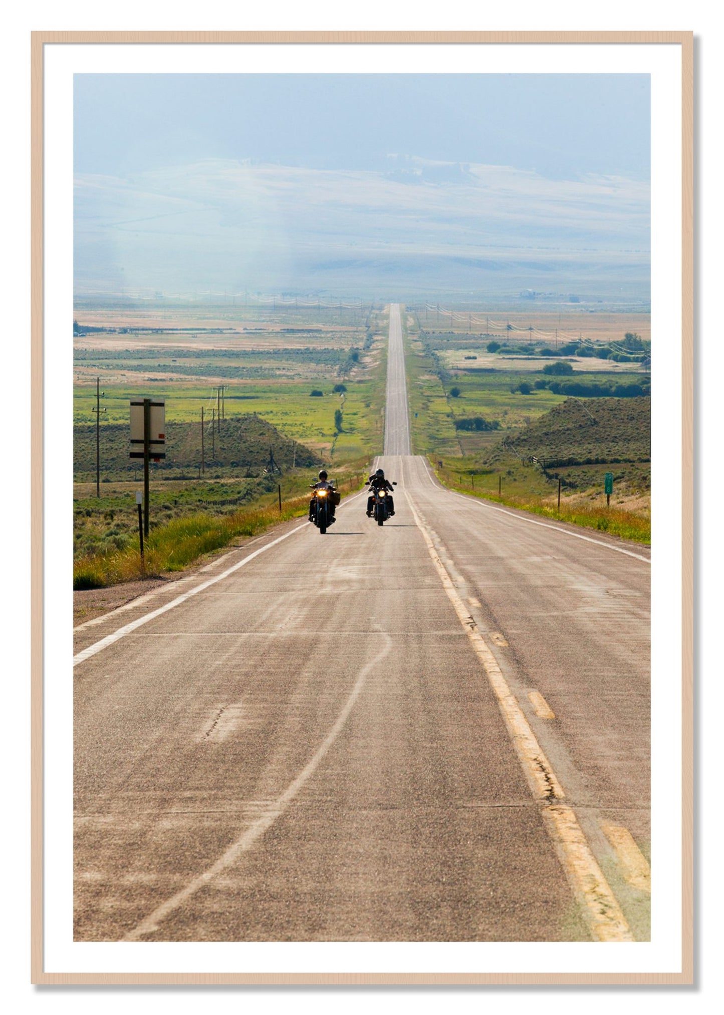 Framed photograph of The Long Road by Dylan Ozanich, Maple frame, Borders