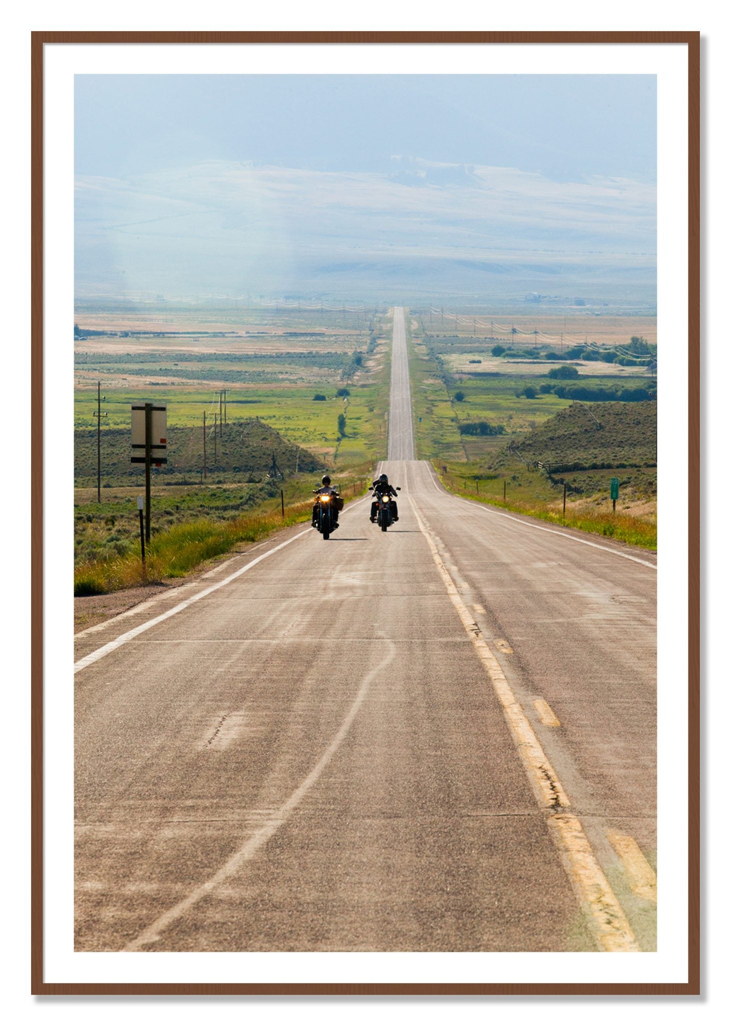 Framed photograph of The Long Road by Dylan Ozanich, Walnut frame, Borders