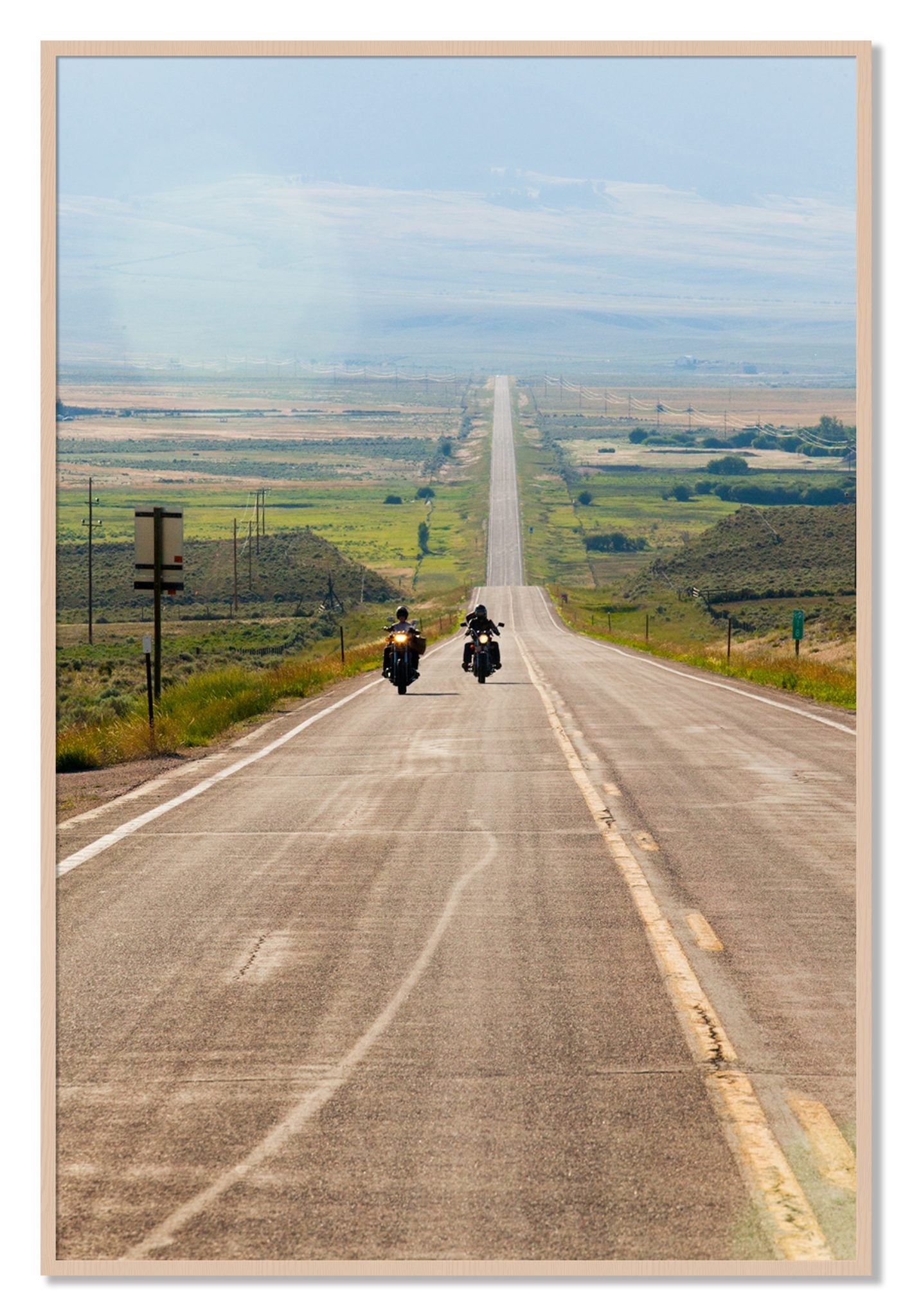 Framed photograph of The Long Road by Dylan Ozanich, Maple frame, Full Bleed