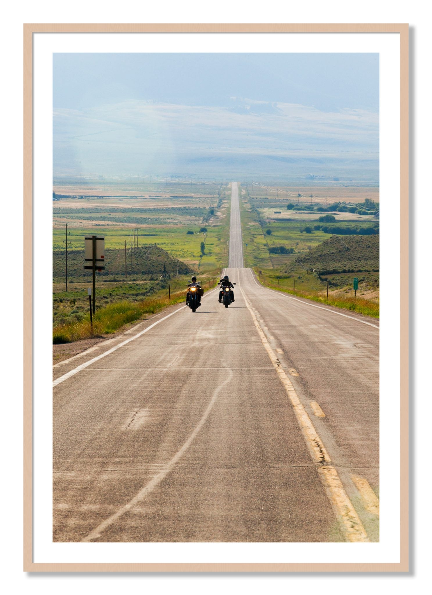 Framed photograph of The Long Road by Dylan Ozanich, Maple frame, Borders