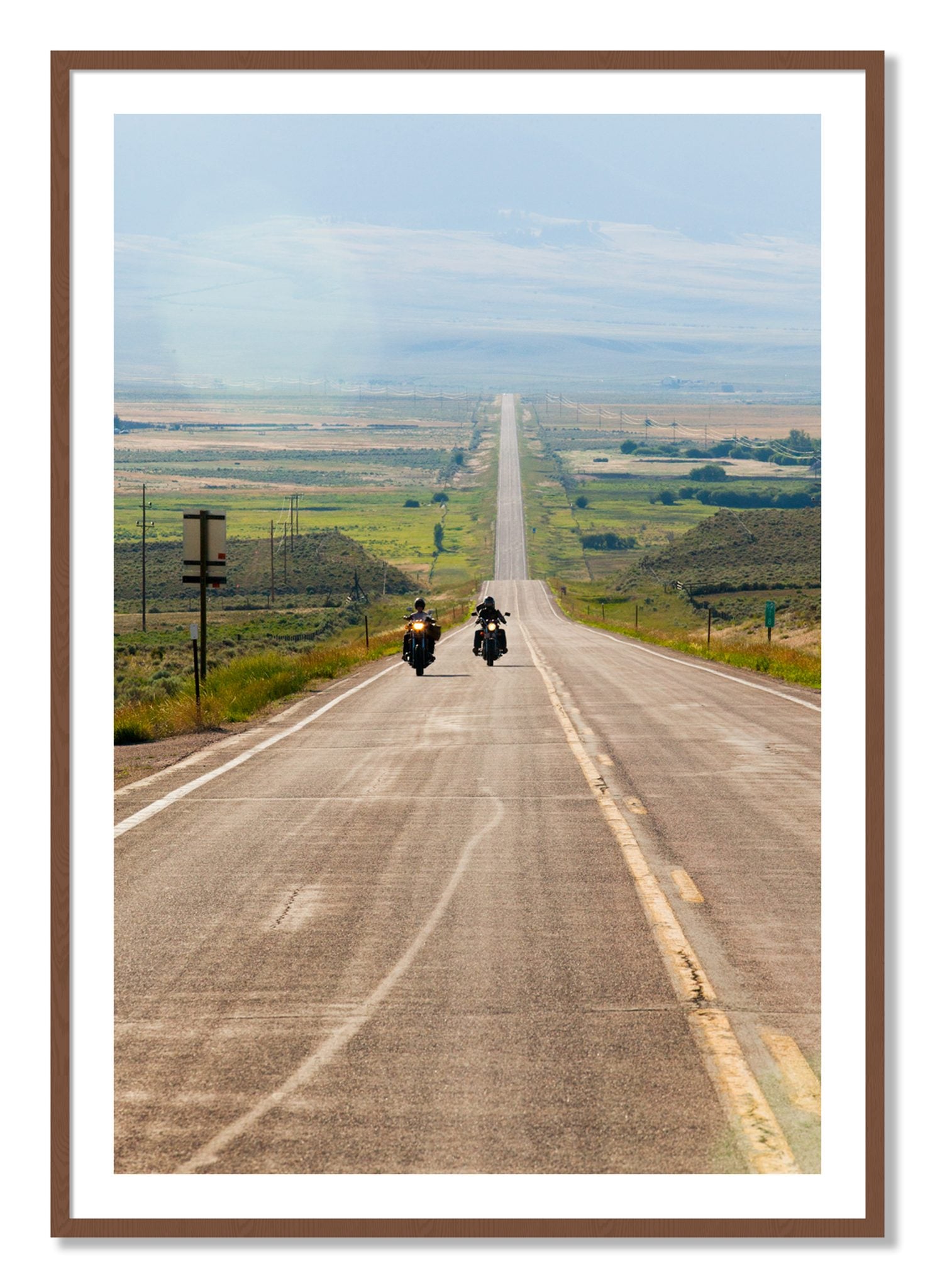 Framed photograph of The Long Road by Dylan Ozanich, Walnut frame, Borders