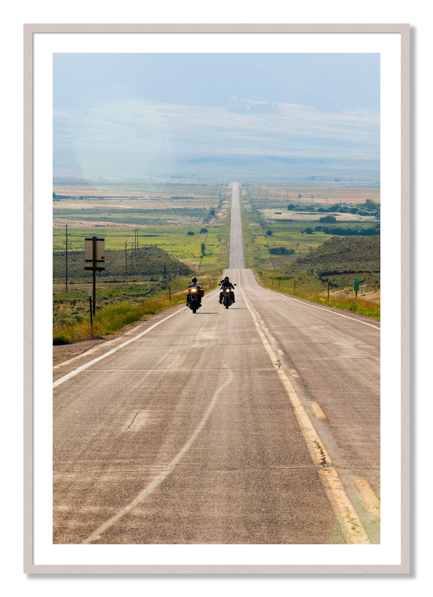 Framed photograph of The Long Road by Dylan Ozanich, White Maple frame, Borders