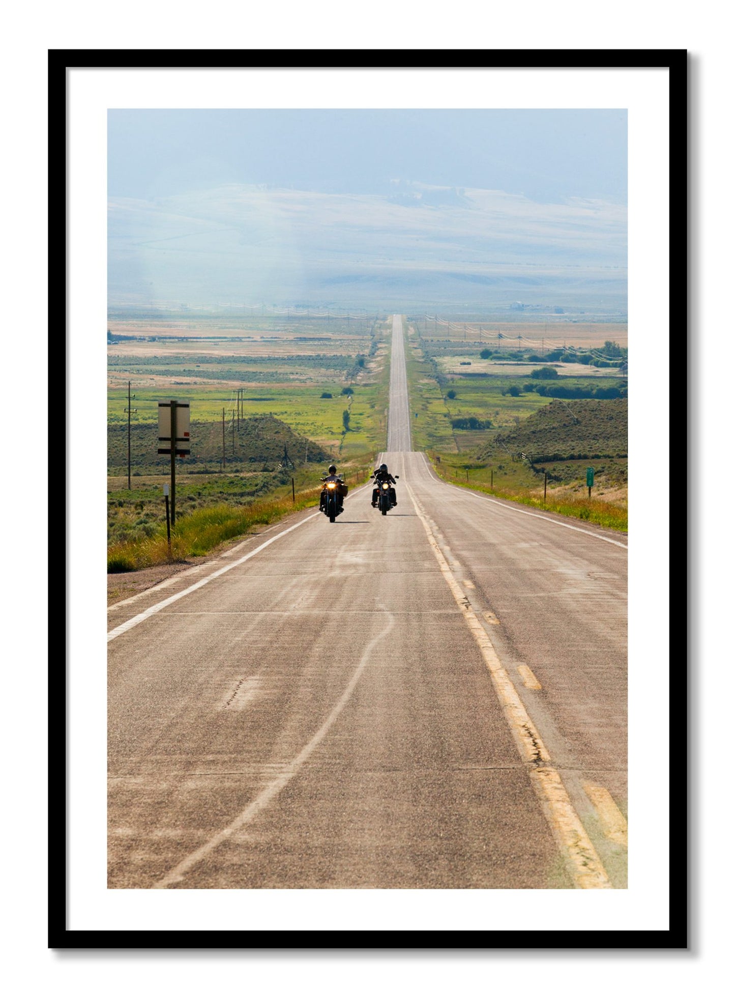 Framed photograph of The Long Road by Dylan Ozanich, Black frame, Borders