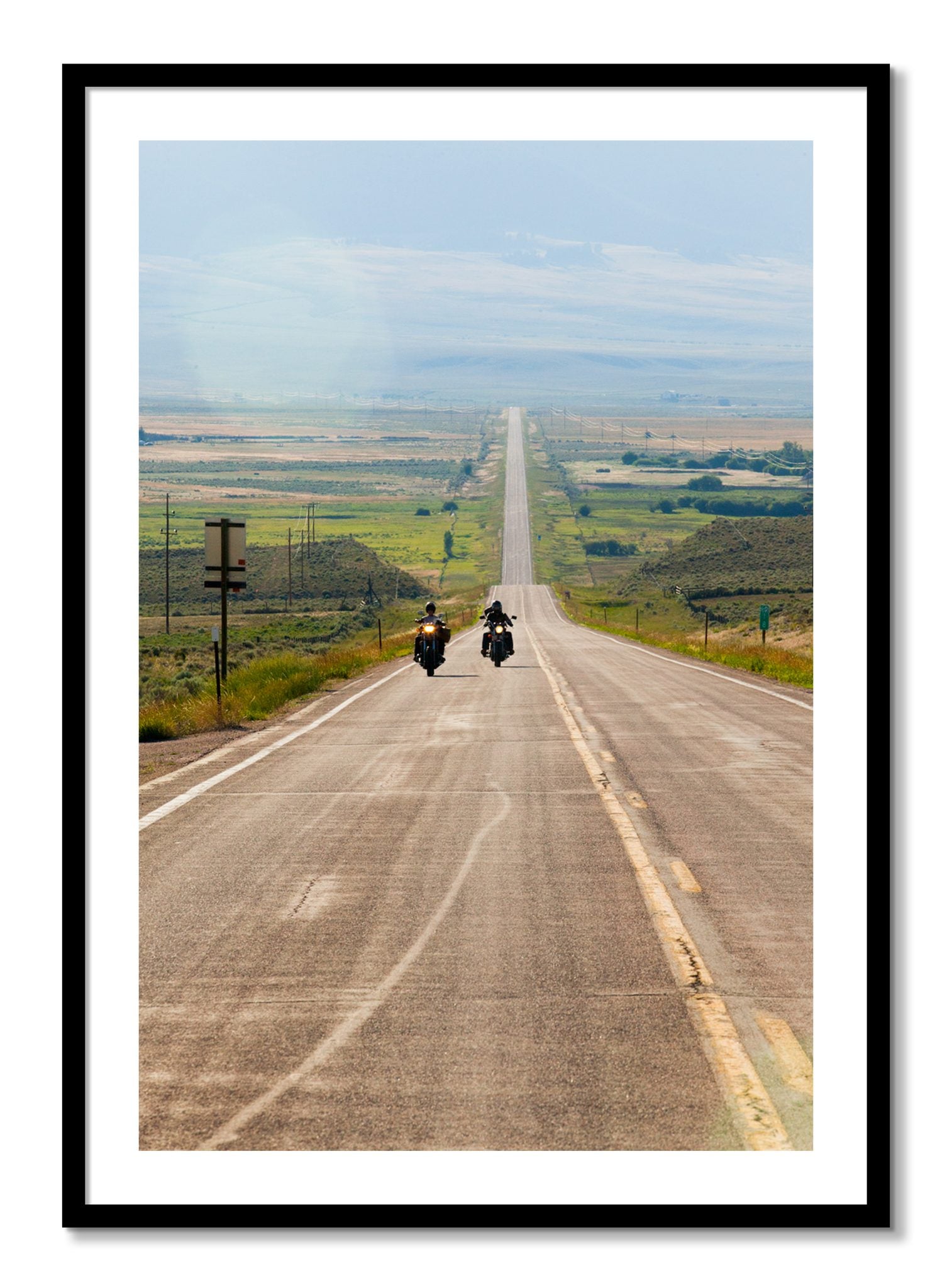 Framed photograph of The Long Road by Dylan Ozanich, Black frame, Borders