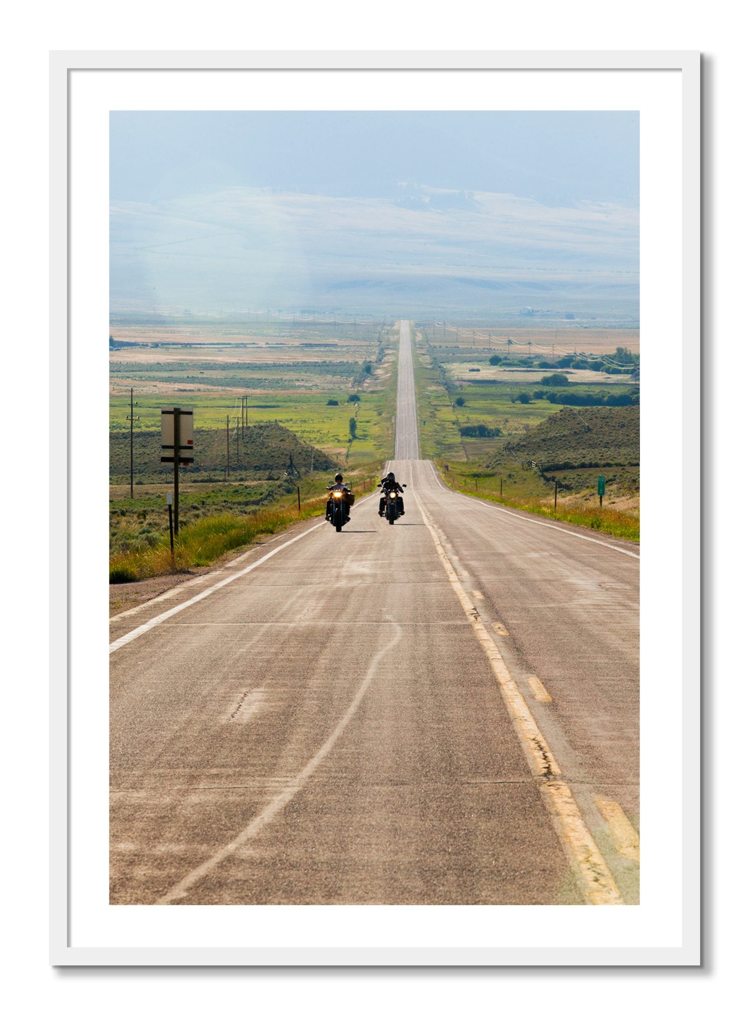 Framed photograph of The Long Road by Dylan Ozanich, White frame, Borders
