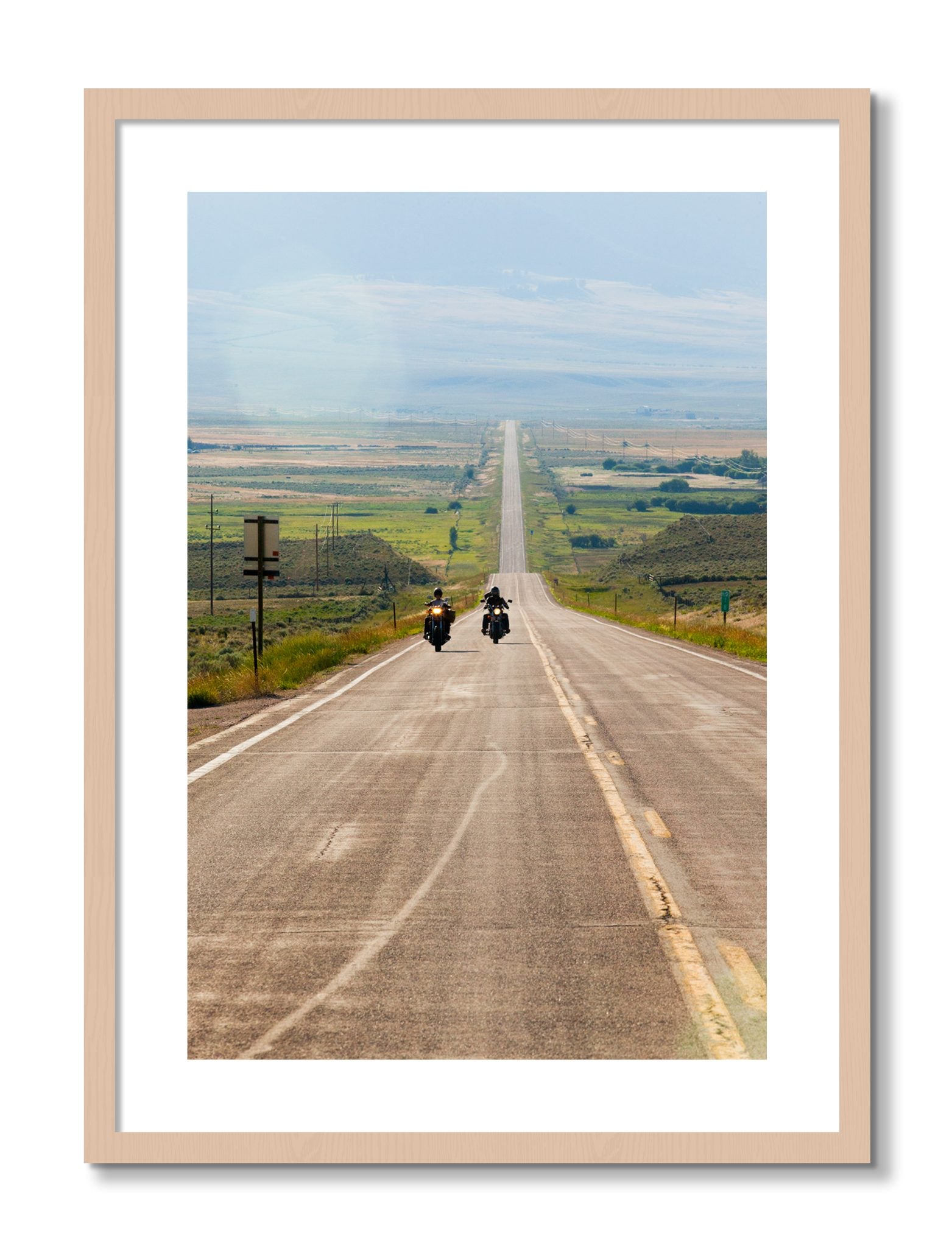 Framed photograph of The Long Road by Dylan Ozanich, Maple frame, Borders