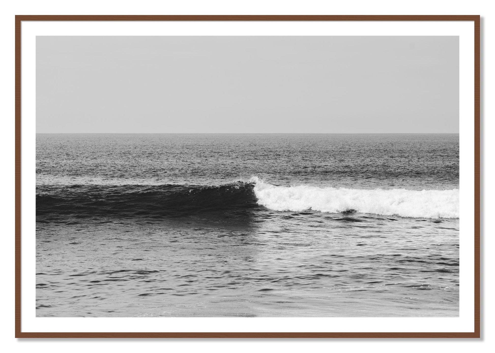Framed photograph of The Wave by Dylan Ozanich, Walnut frame, Borders