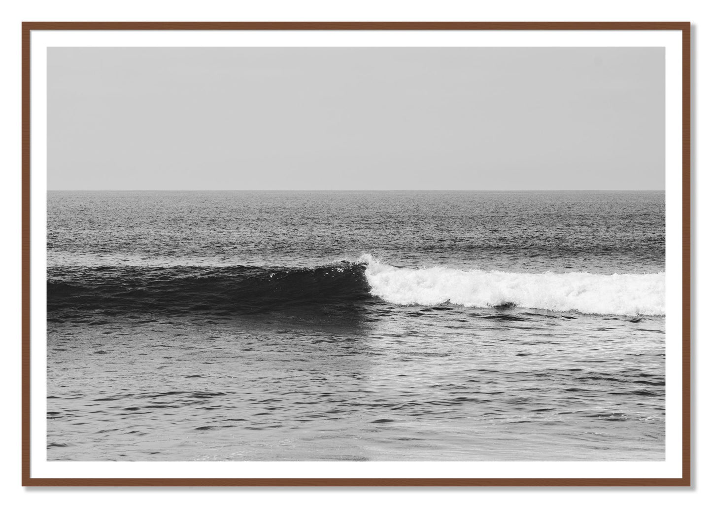 Framed photograph of The Wave by Dylan Ozanich, Walnut frame, Borders