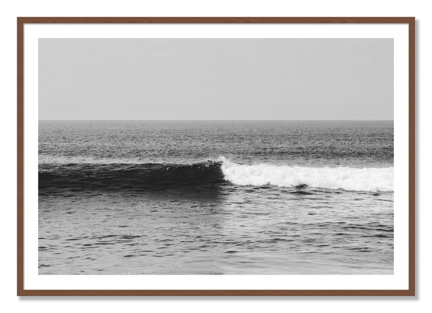 Framed photograph of The Wave by Dylan Ozanich, Walnut frame, Borders