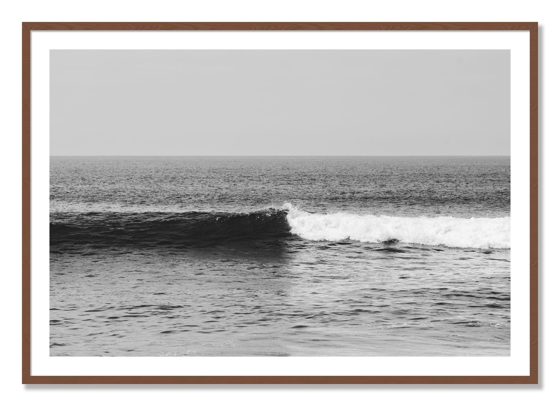 Framed photograph of The Wave by Dylan Ozanich, Walnut frame, Borders