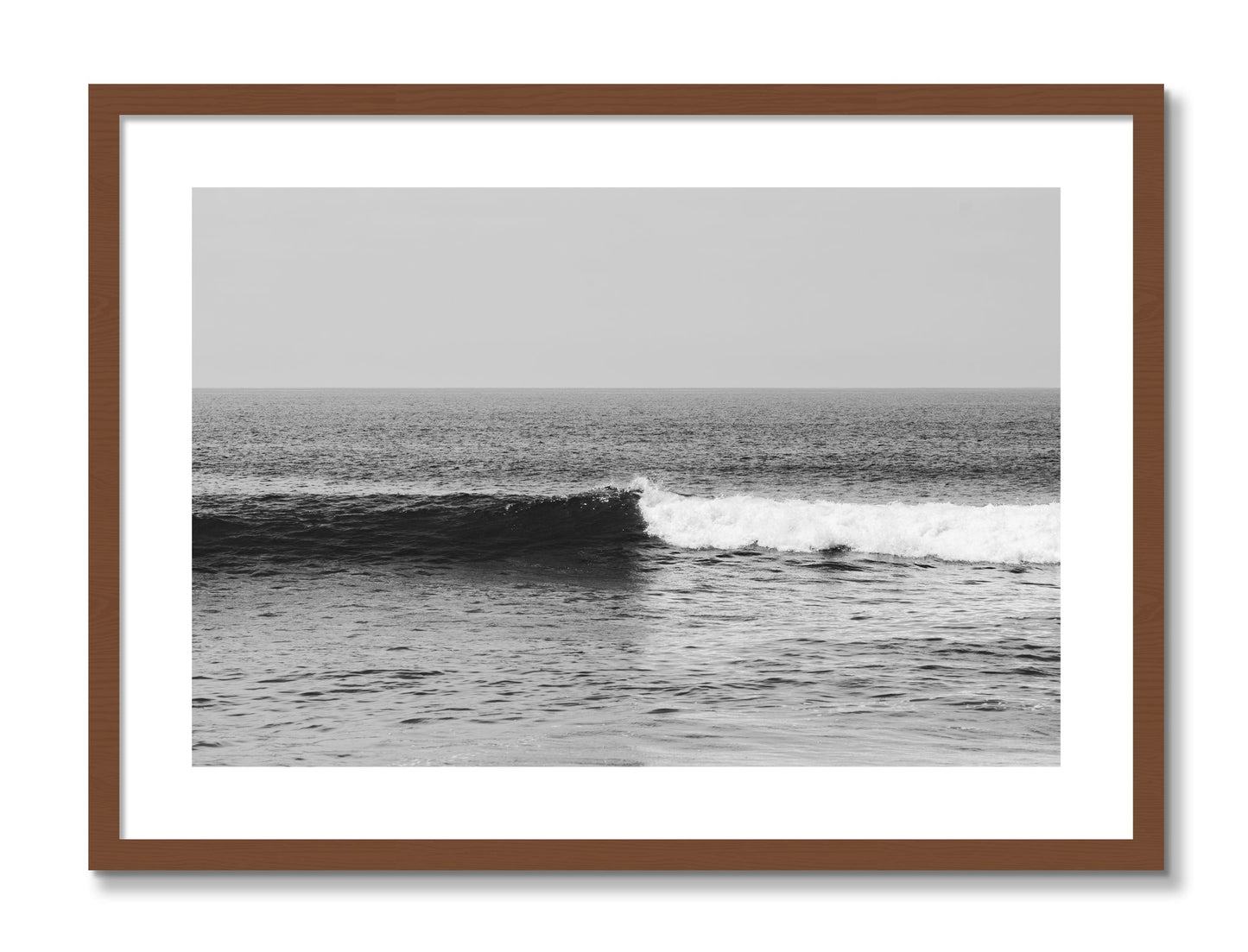 Framed photograph of The Wave by Dylan Ozanich, Walnut frame, Borders