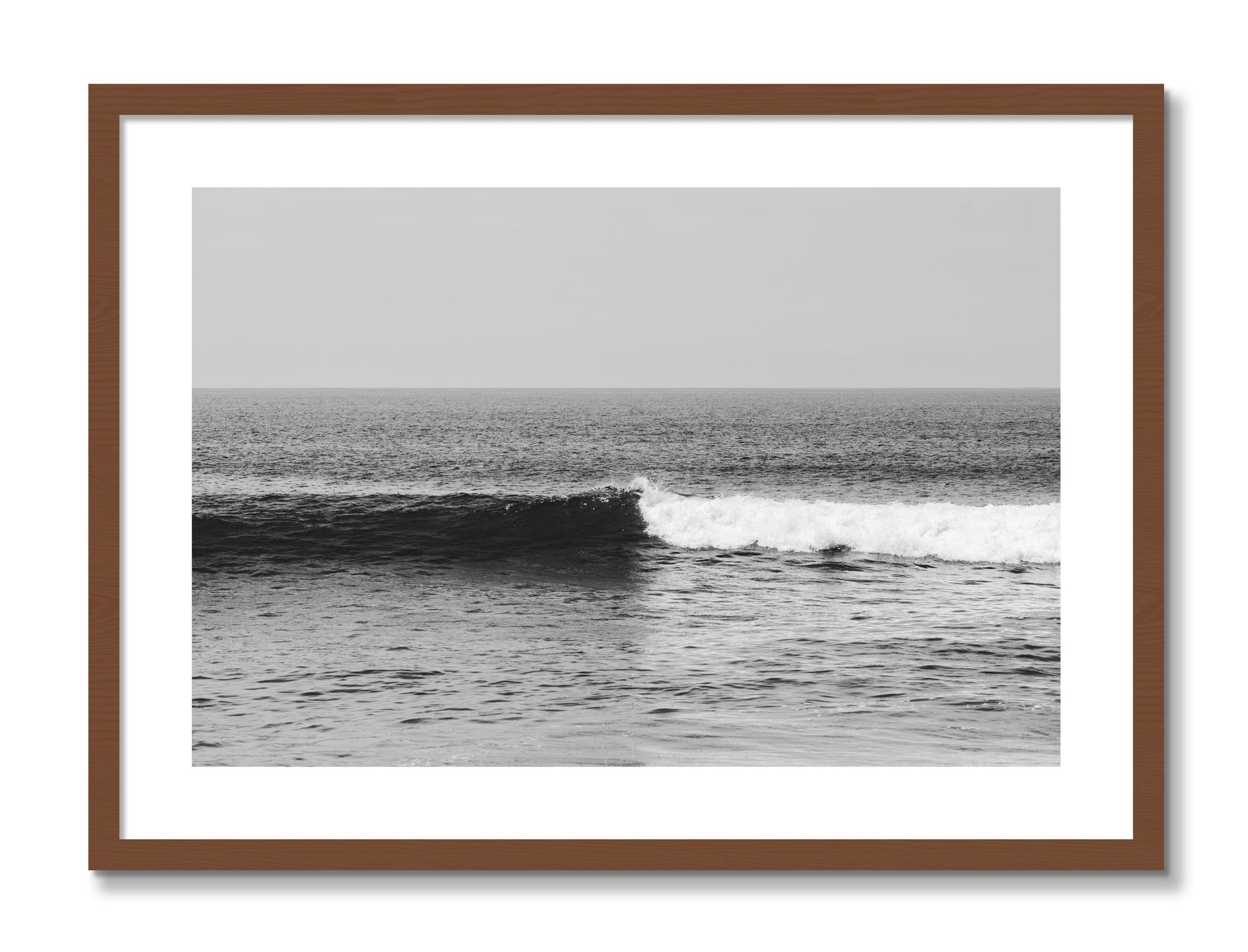 Framed photograph of The Wave by Dylan Ozanich, Walnut frame, Borders