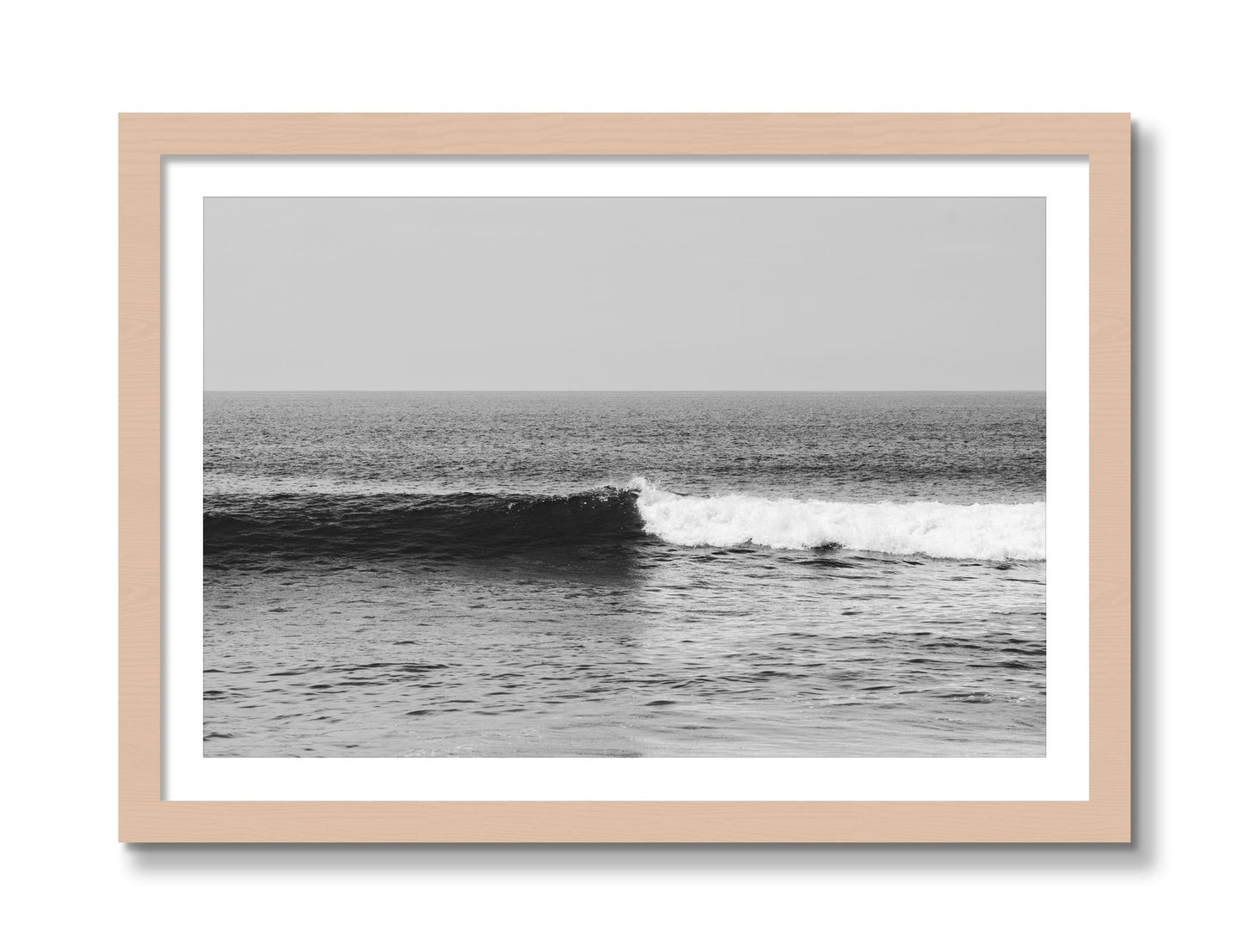 Framed photograph of The Wave by Dylan Ozanich, Maple frame, Borders