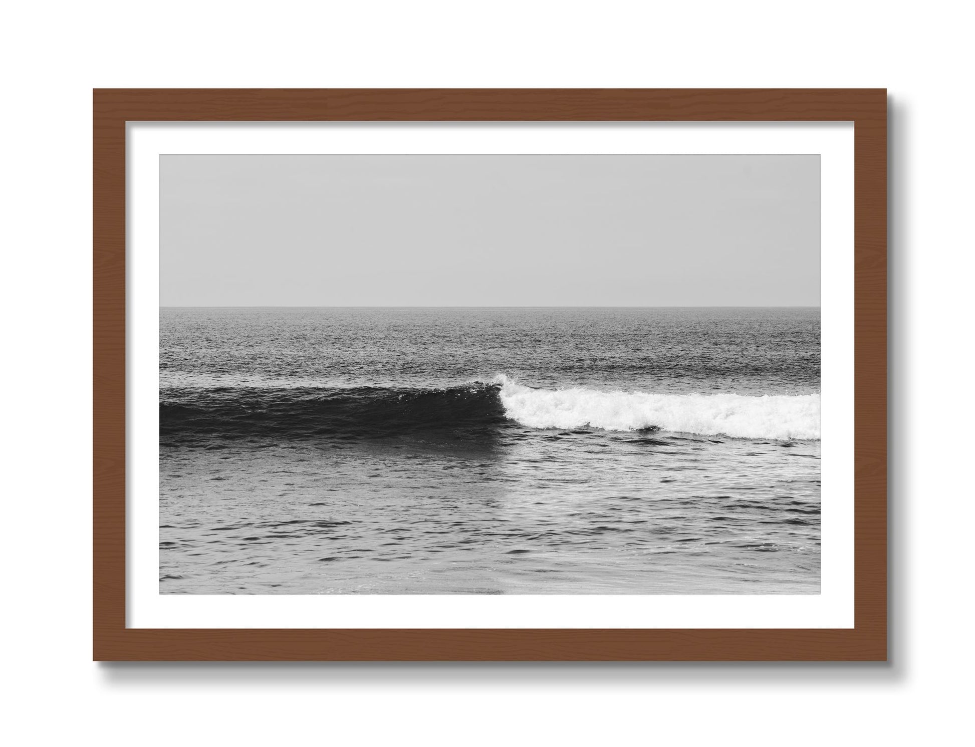 Framed photograph of The Wave by Dylan Ozanich, Walnut frame, Borders