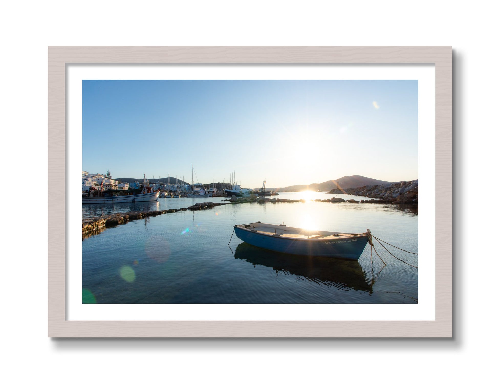Framed photograph of Tied Down In Paros by Dylan Ozanich, White Maple frame, Borders