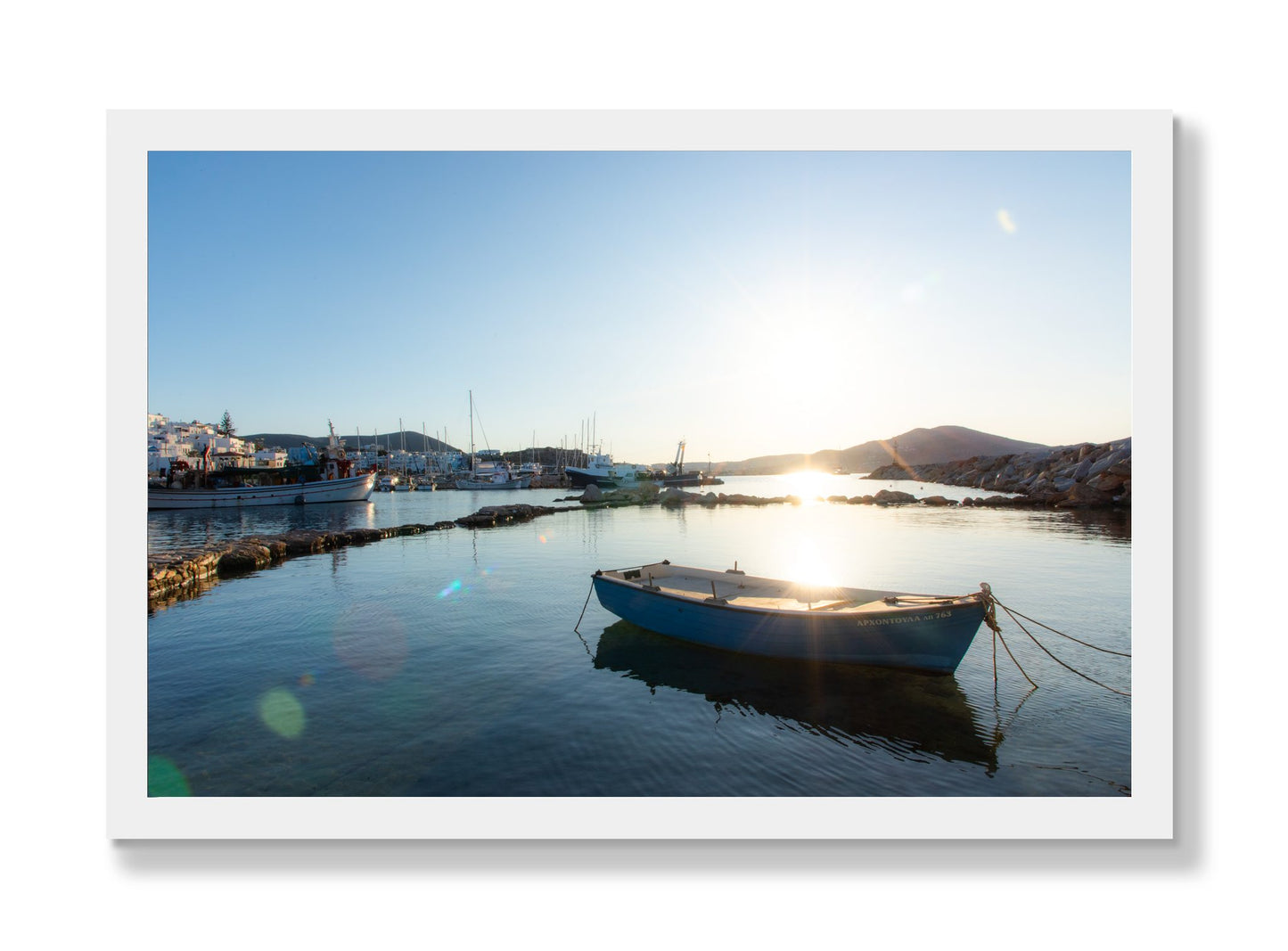 Framed photograph of Tied Down In Paros by Dylan Ozanich, White frame, Full Bleed