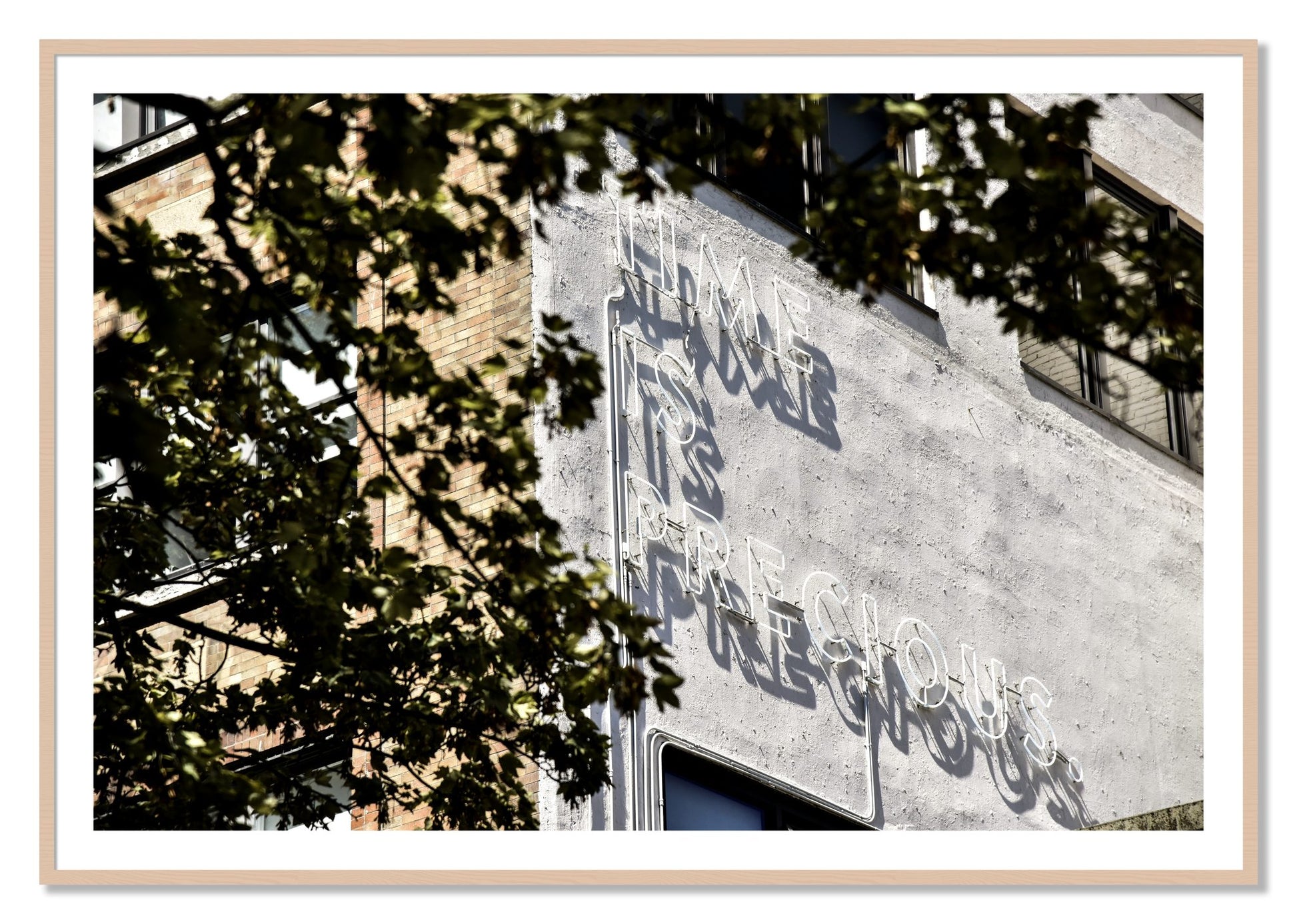 Framed photograph of Time Is Precious by Dylan Ozanich, Maple frame, Borders