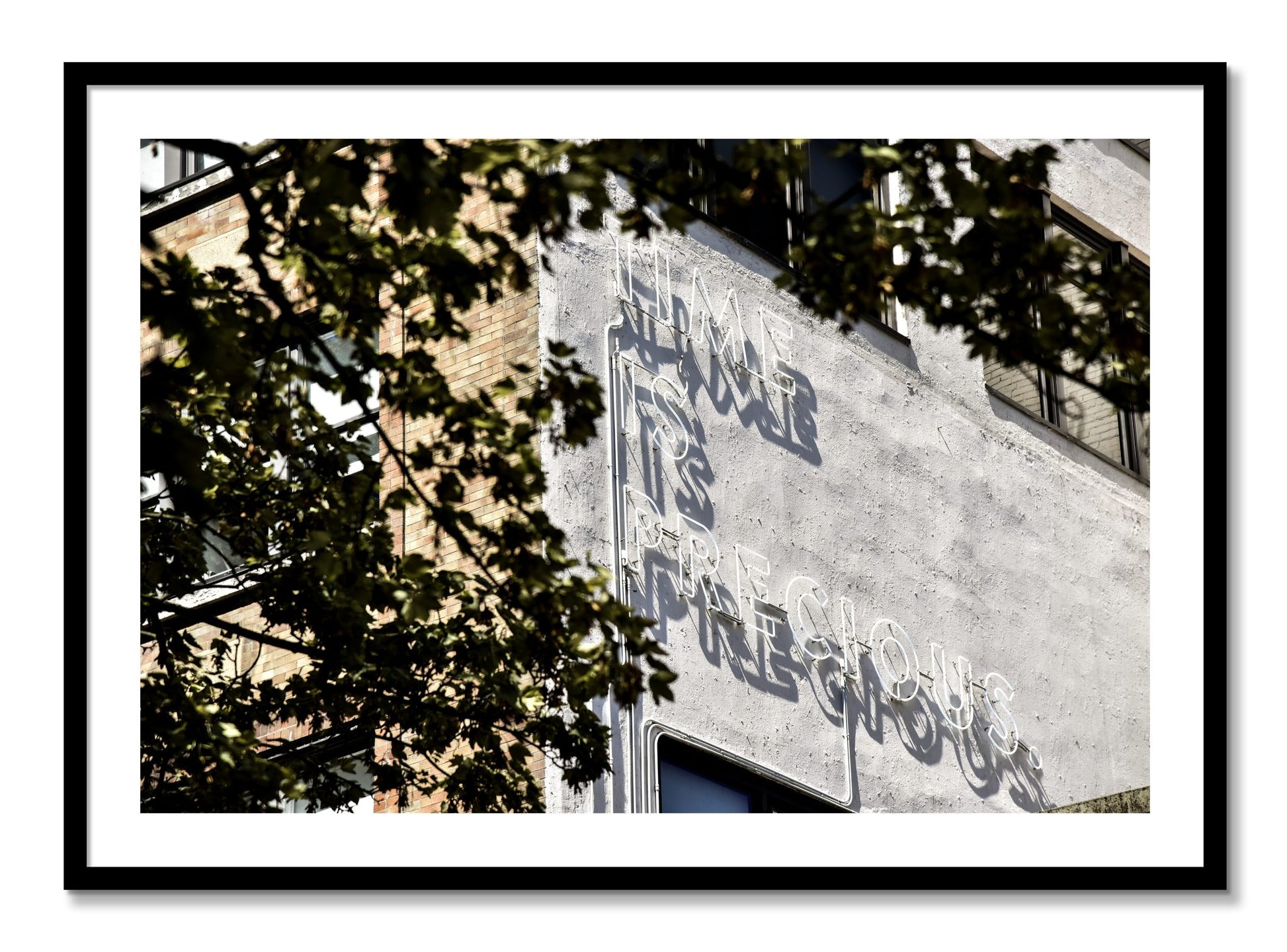 Framed photograph of Time Is Precious by Dylan Ozanich, Black frame, Borders