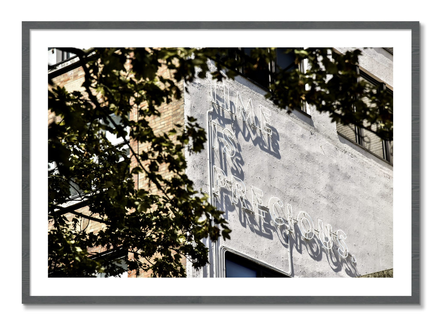 Framed photograph of Time Is Precious by Dylan Ozanich, Grey frame, Borders