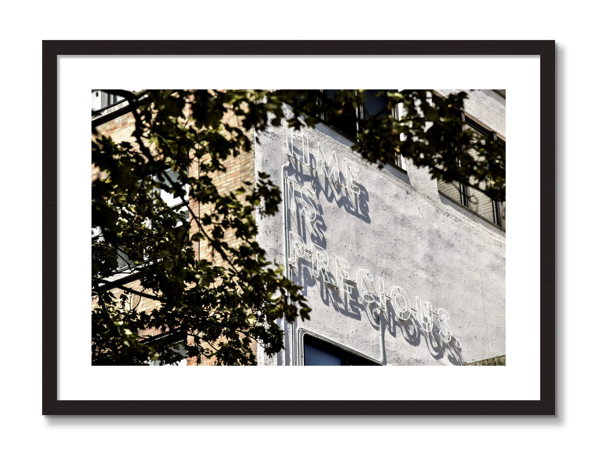 Framed photograph of Time Is Precious by Dylan Ozanich, Black Walnut frame, Borders