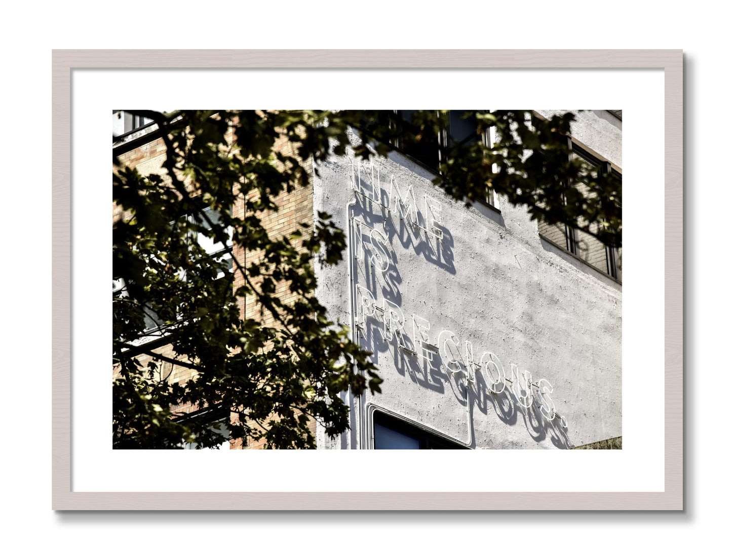 Framed photograph of Time Is Precious by Dylan Ozanich, White Maple frame, Borders