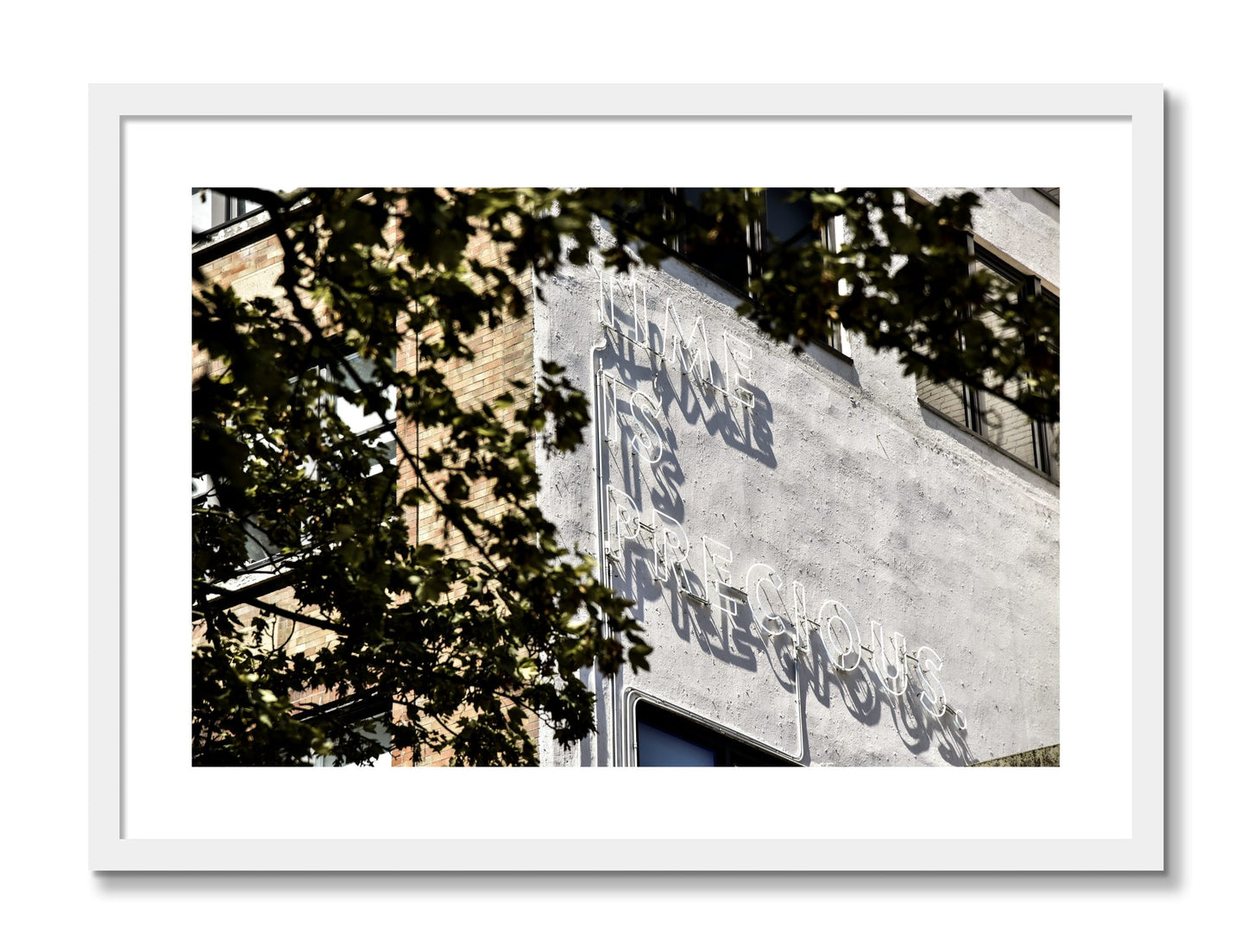 Framed photograph of Time Is Precious by Dylan Ozanich, White frame, Borders