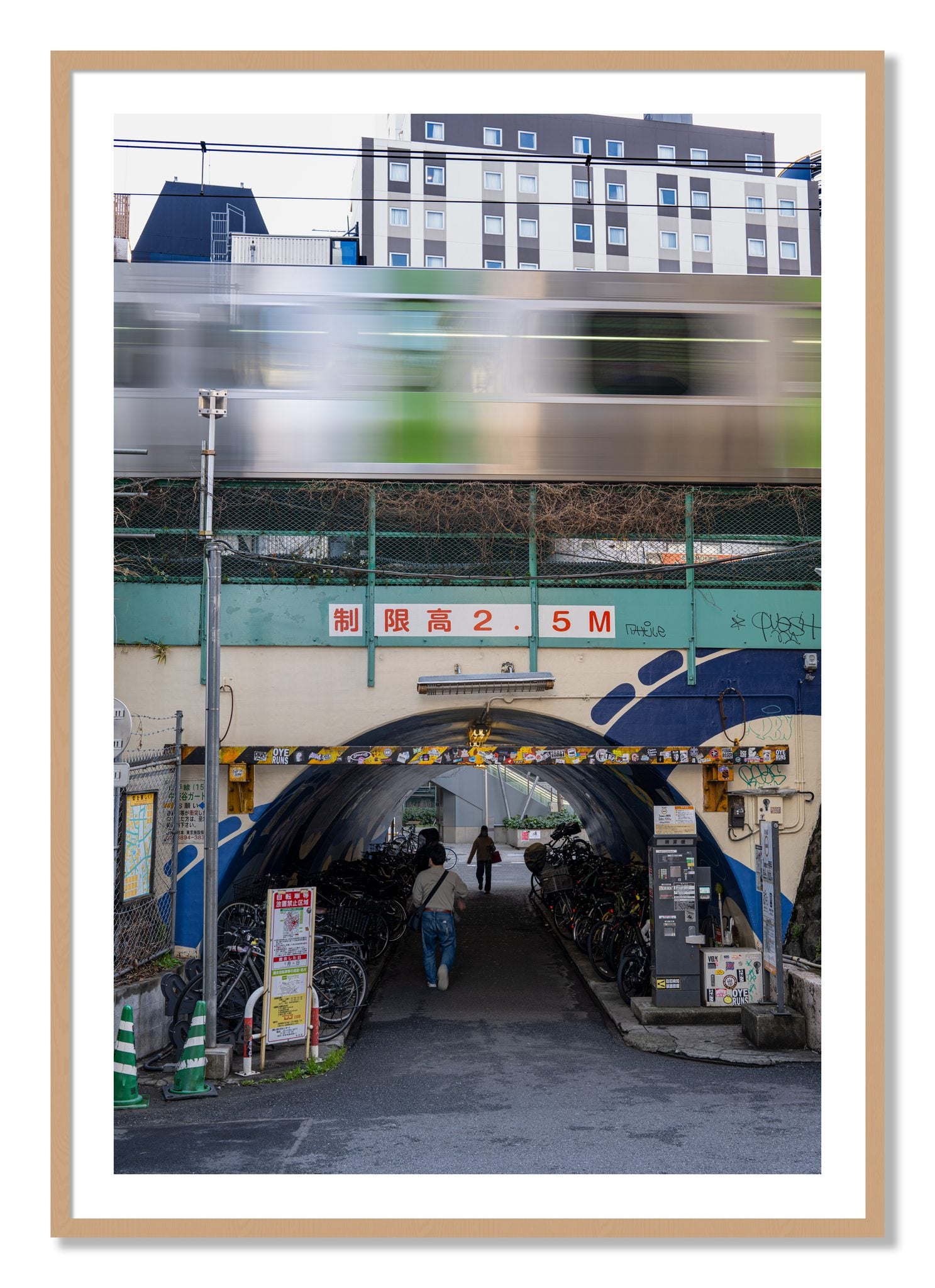 Framed photograph of Tokyo Bustle by Dylan Ozanich, Oak frame, Borders